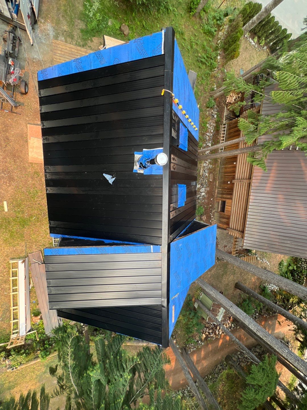 Residential ReRoofing Installation using 12" Prolok metal  by Top Notch Roofing Inc