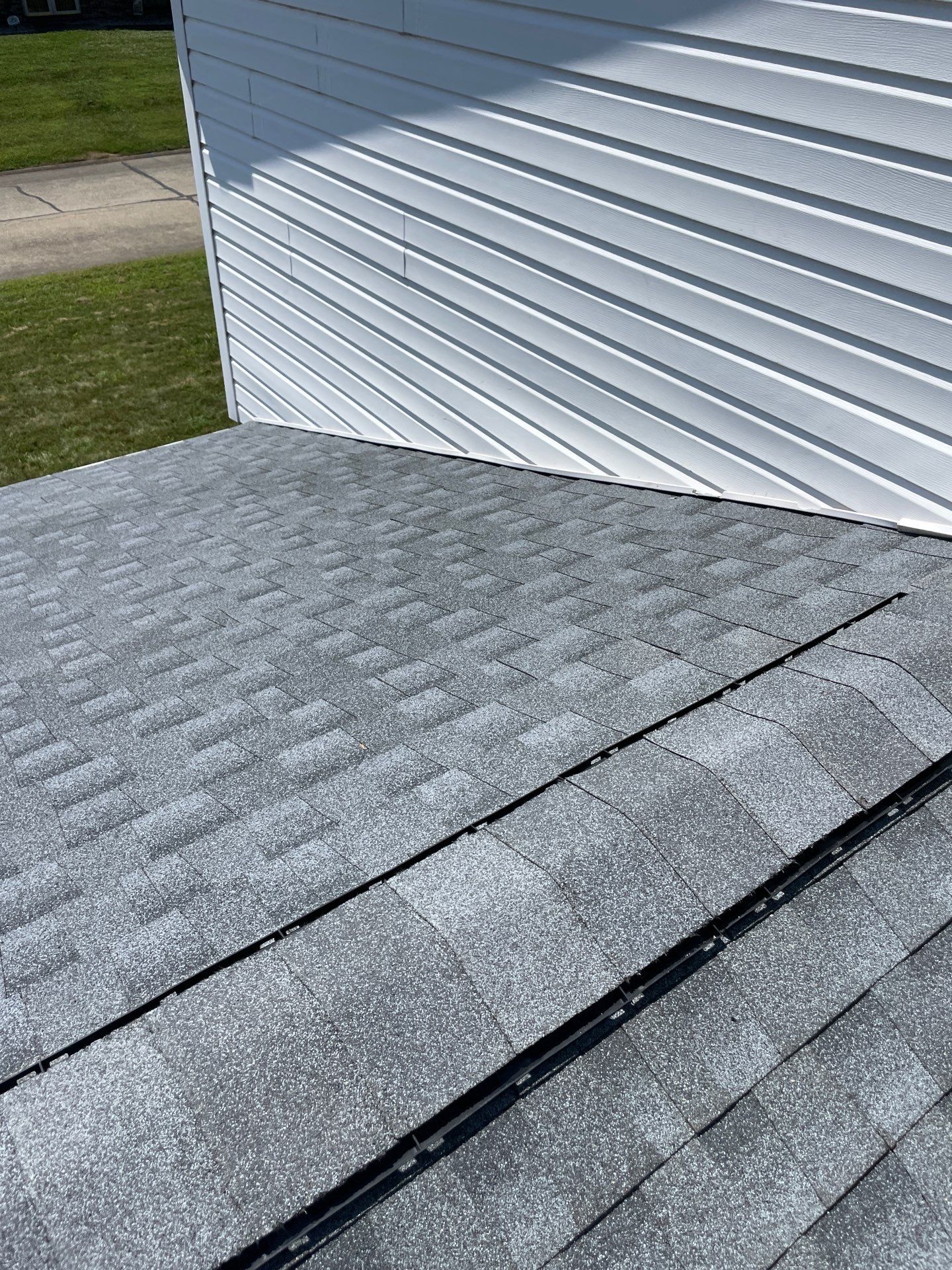 Residential Roofing Installation using GAF Timberline HDZ Oyster Grey by Rainstoppers Roofing