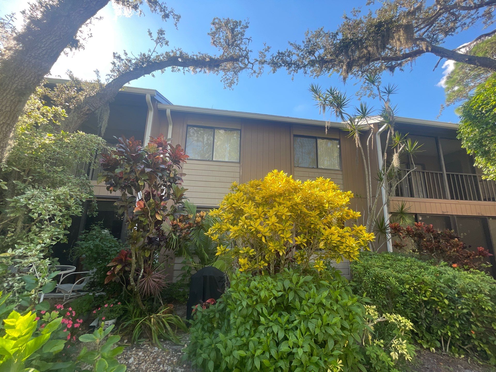 Clean Gutters and Roof in Sarasota FL by Gutter Professors