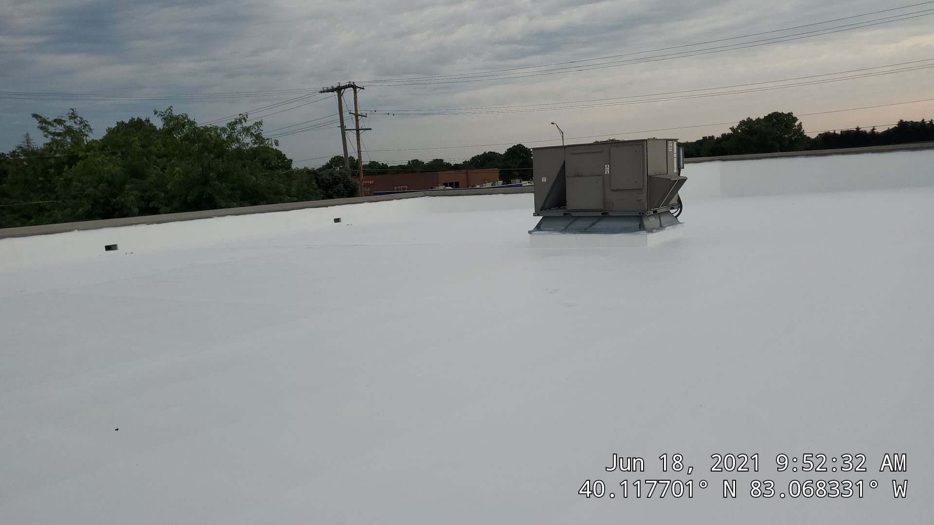 Fabric Reinforced Roof Coating by Gold Star Roofing LLC 