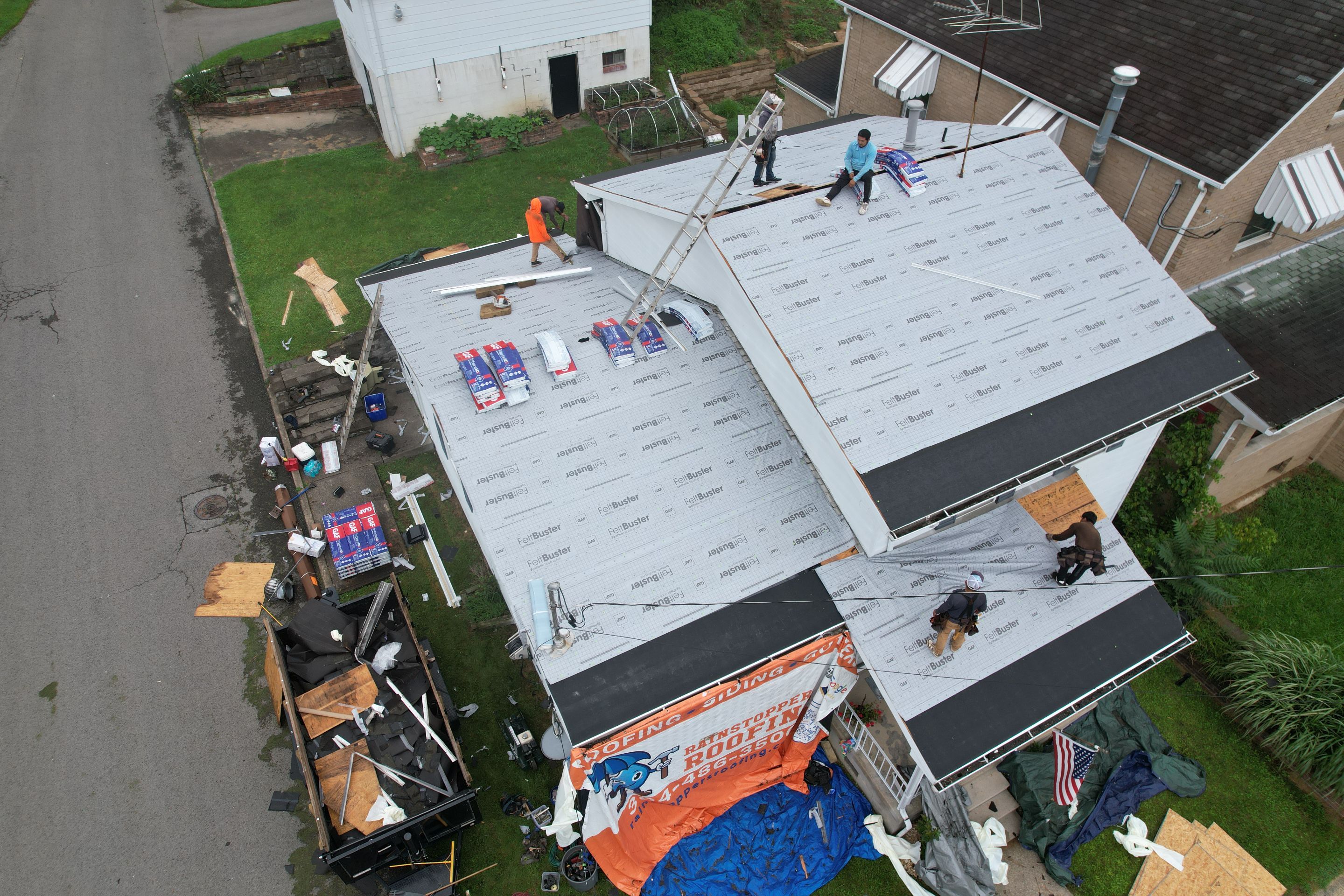 Residential Roofing Installation using GAF Timberline HDZ Oyster Grey by Rainstoppers Roofing
