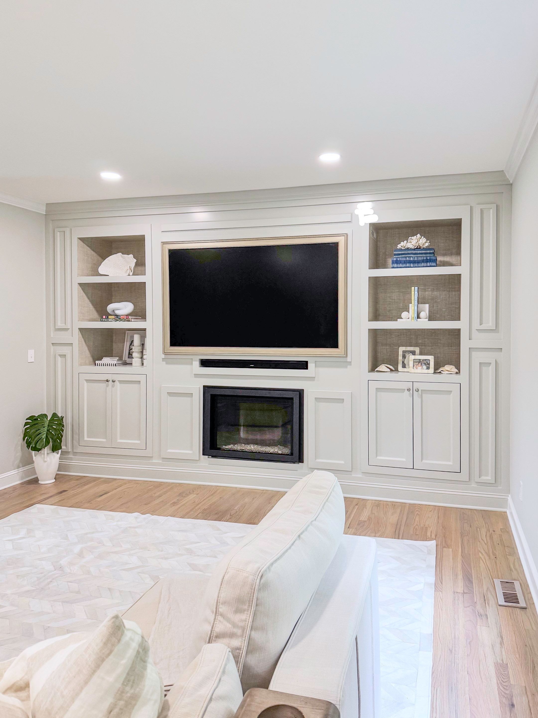 Built-in TV unit by Trendy Walls Inc.