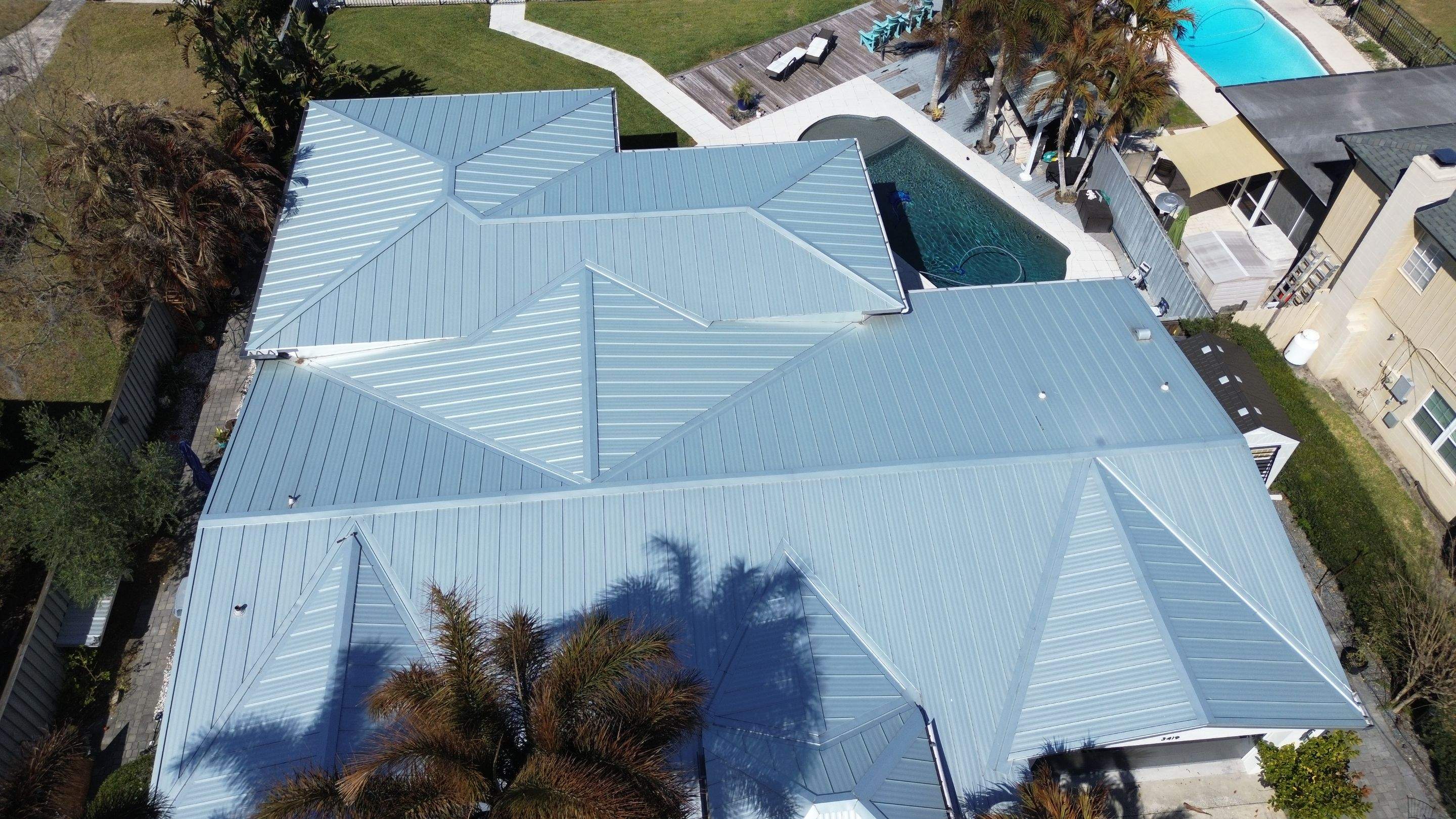 Metal reroof project in Belle Isle FL by Gold Key Roofing