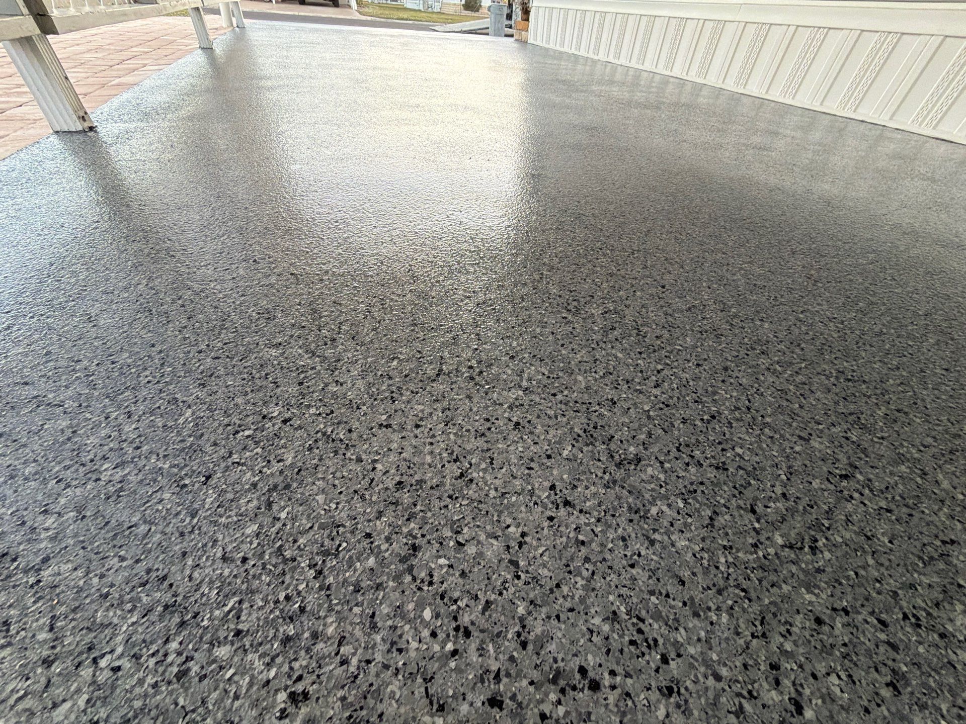 Driveway Transformation: Nightfall Flake System with Full UV & Moisture Protection by Performance Floors & Coating