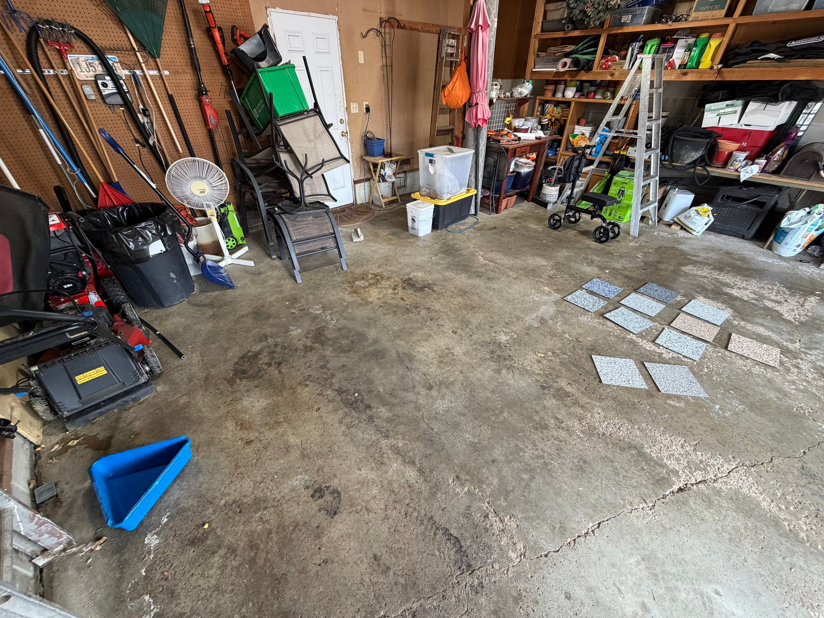 Sioux Falls Garage Epoxy Floor Installation and Concrete Crack Repair by Select Painting, Coatings & Garage Cabinets