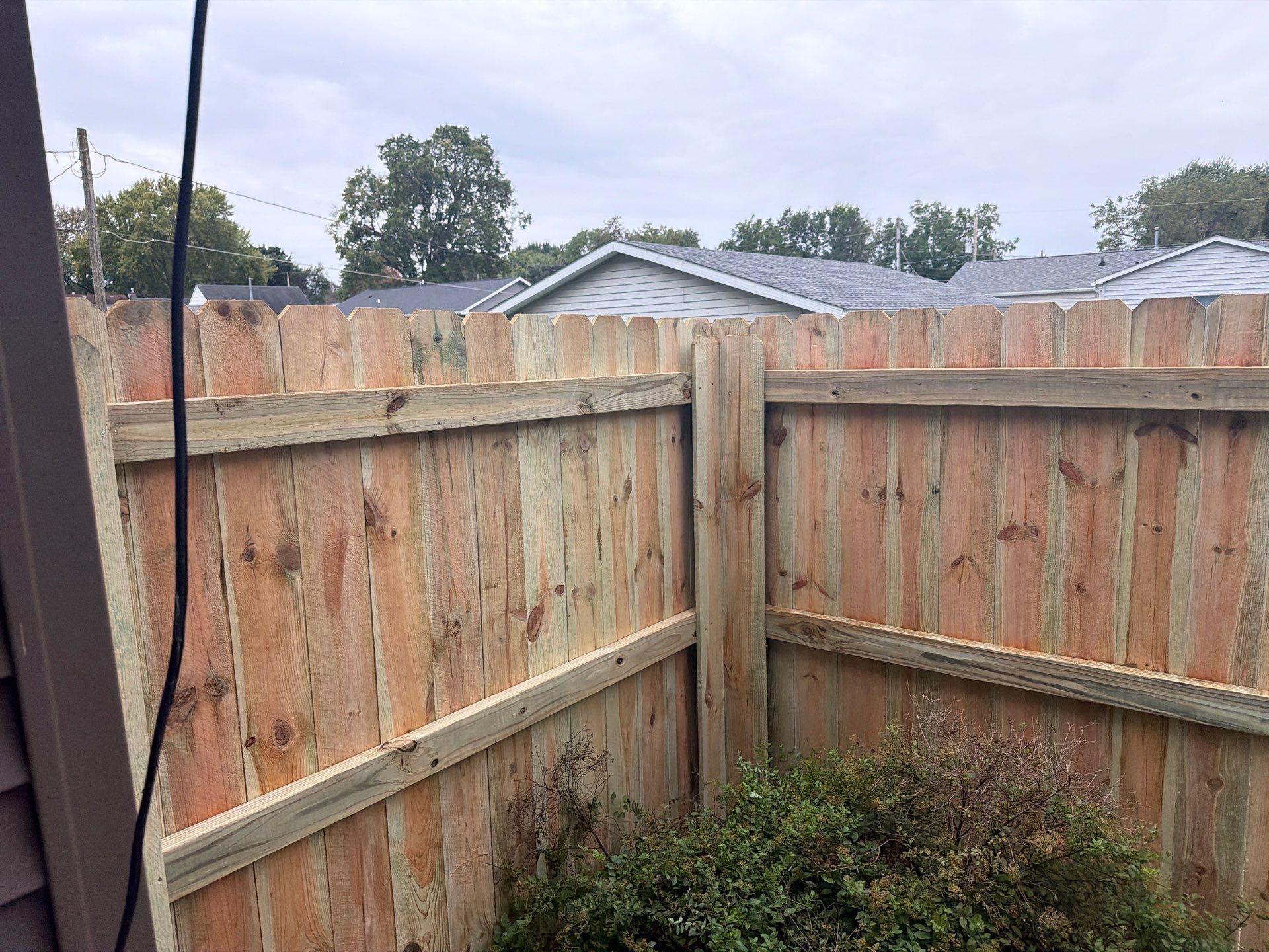 Custom Wood Privacy and Black Chain Link Fence in Hudson by Perfect Picket Fence and Stain