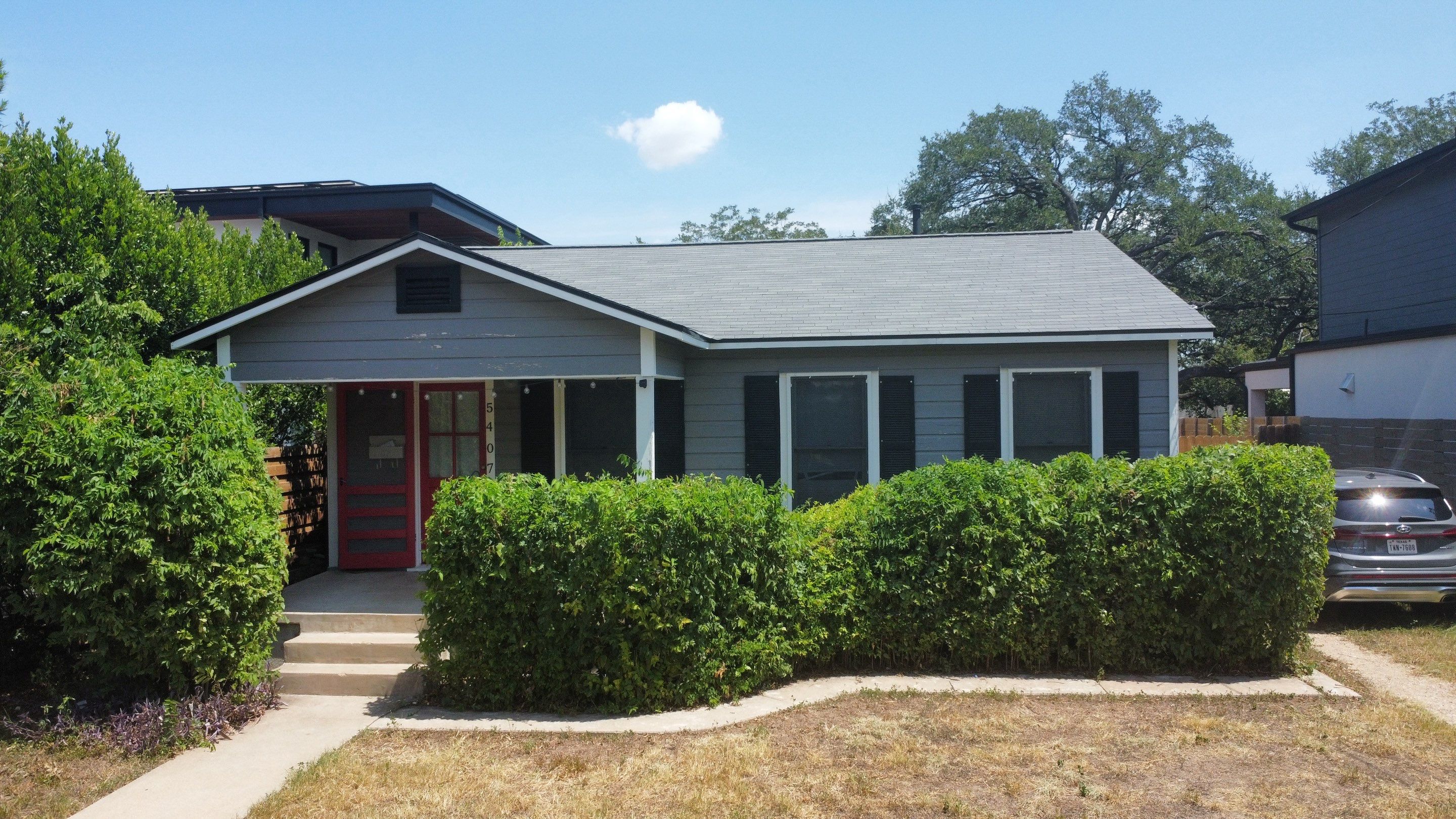 Full Roof Replacement – Main Home + Guest House | Estate Gray Shingles | Austin, TX by Kstylez Roofing & Construction