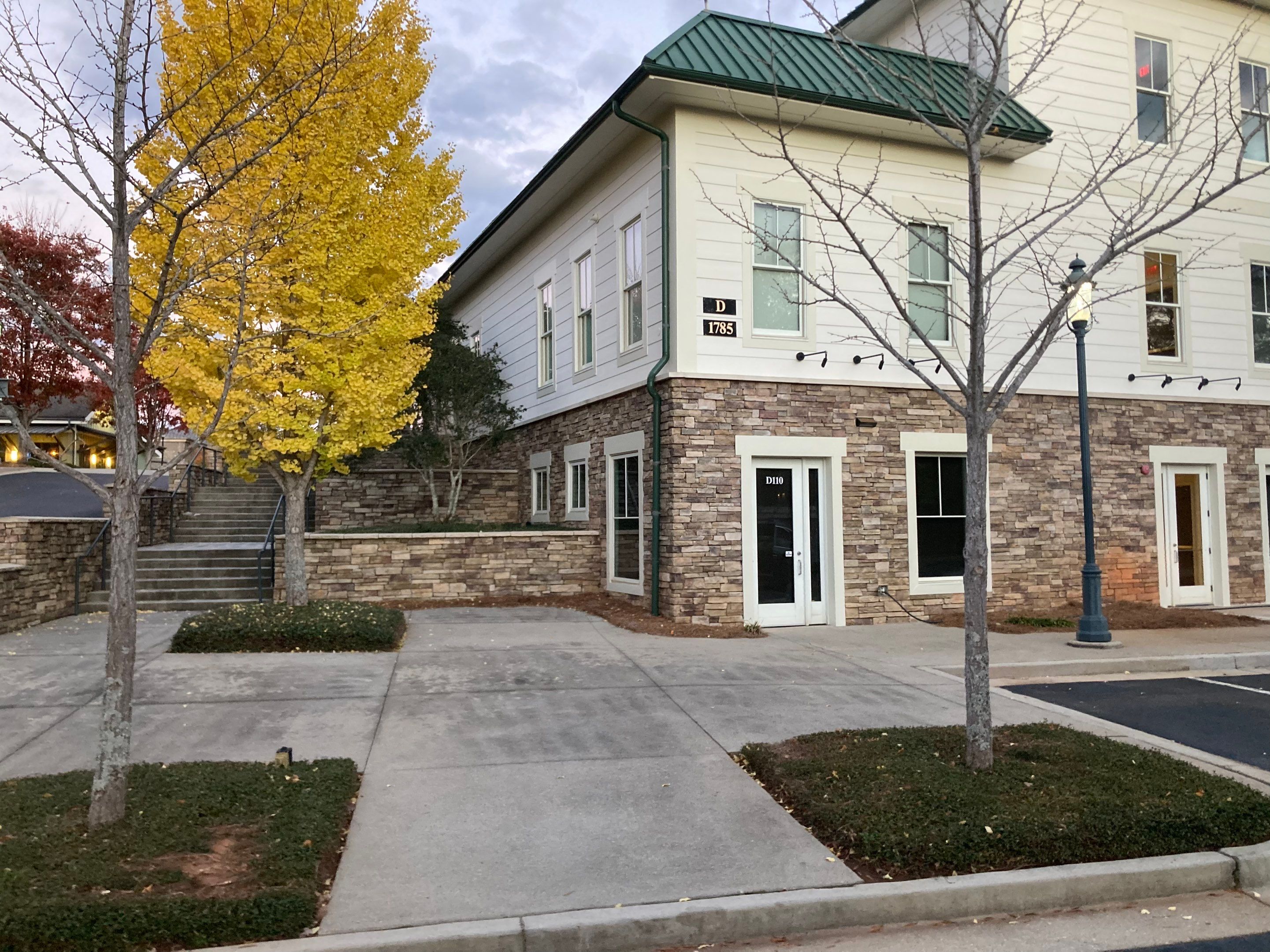 Commercial Exterior & Stairwell Painting – Corner Market by PGP Surface Solutions, LLC
