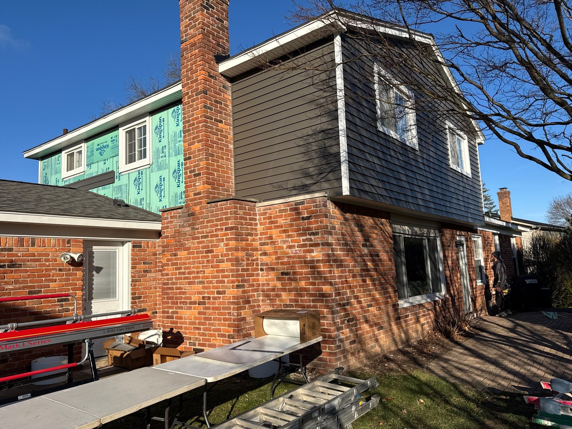 Siding Replacement using Alside Charcoal Smoke and Roof Replacement using Owens Corning Peppercorn by 180 Contractors