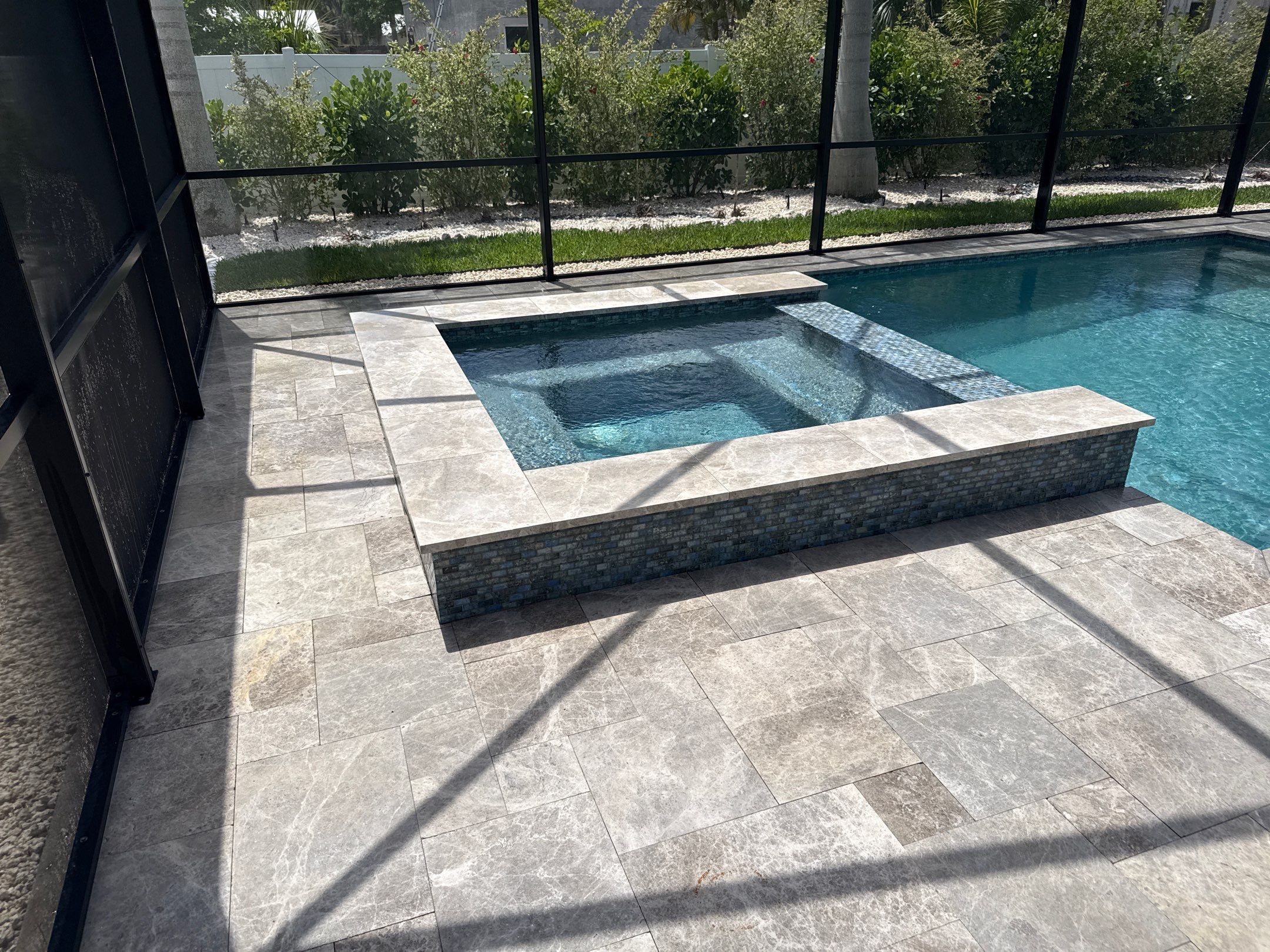 Travertine Pool Deck, Lanai & Screen Enclosure Cleaning Near Manatee River | Bradenton, FL by Sunshine AquaWash