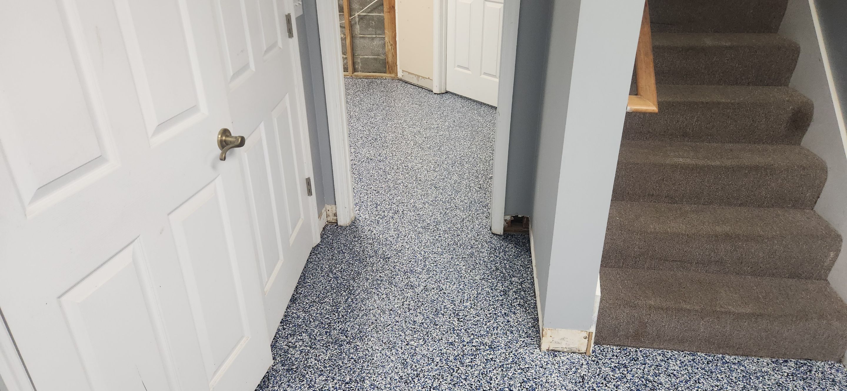 Basement using Denim by Elite Floor Solutions