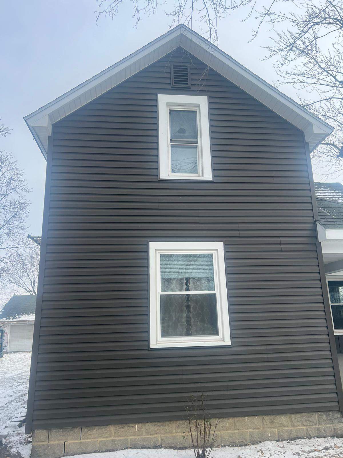 Residential fascia replacement using Exterior Portfolio 4.5 DL - Peppercorn by Nitro Roofing and Construction