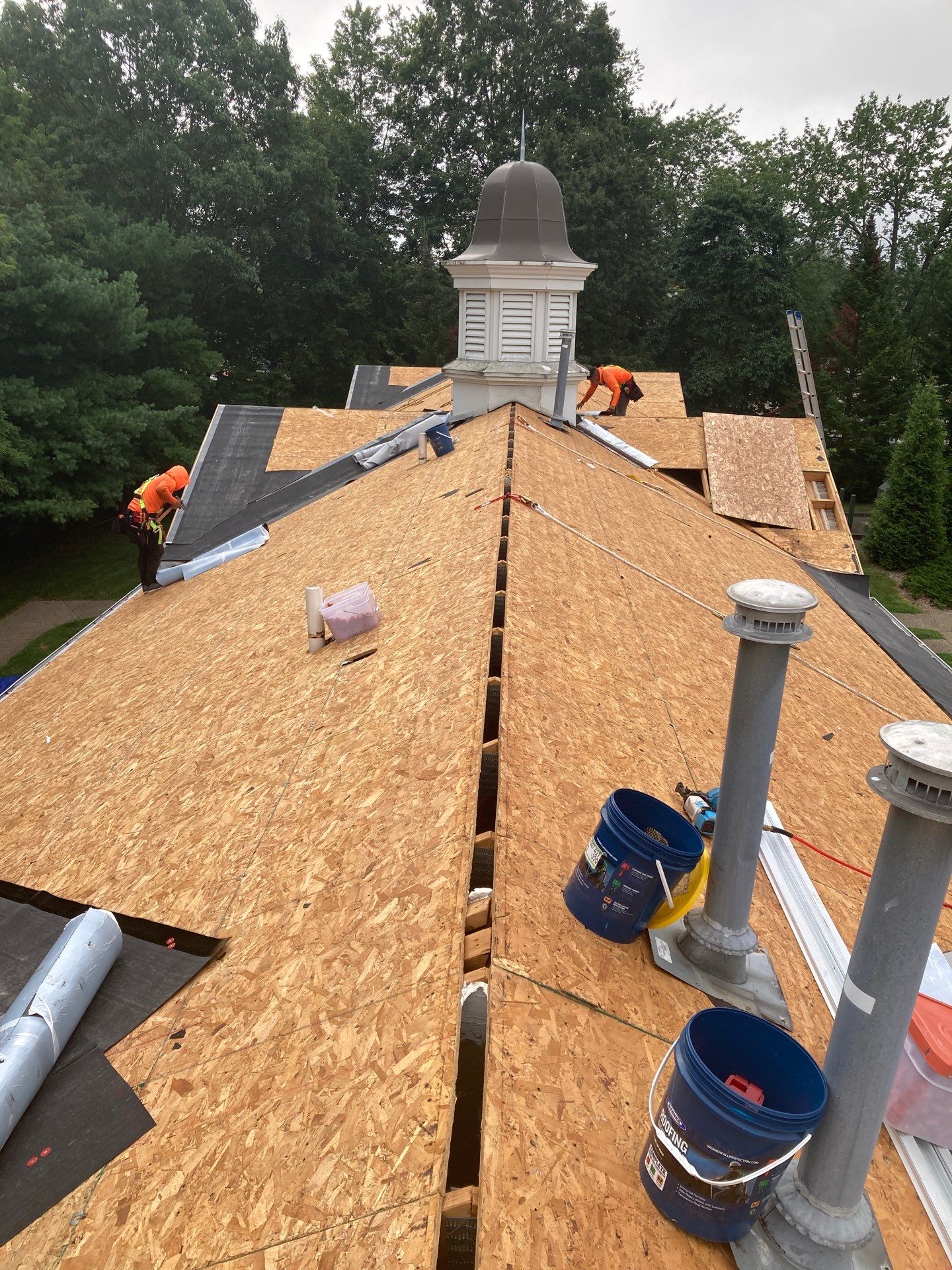 Commercial Roofing Installation using GAF Timberline HDZ Charcoal by Rainstoppers Roofing