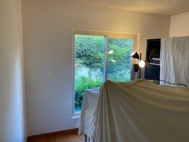 Clean and Simple Bedroom by Asis Painting Inc 