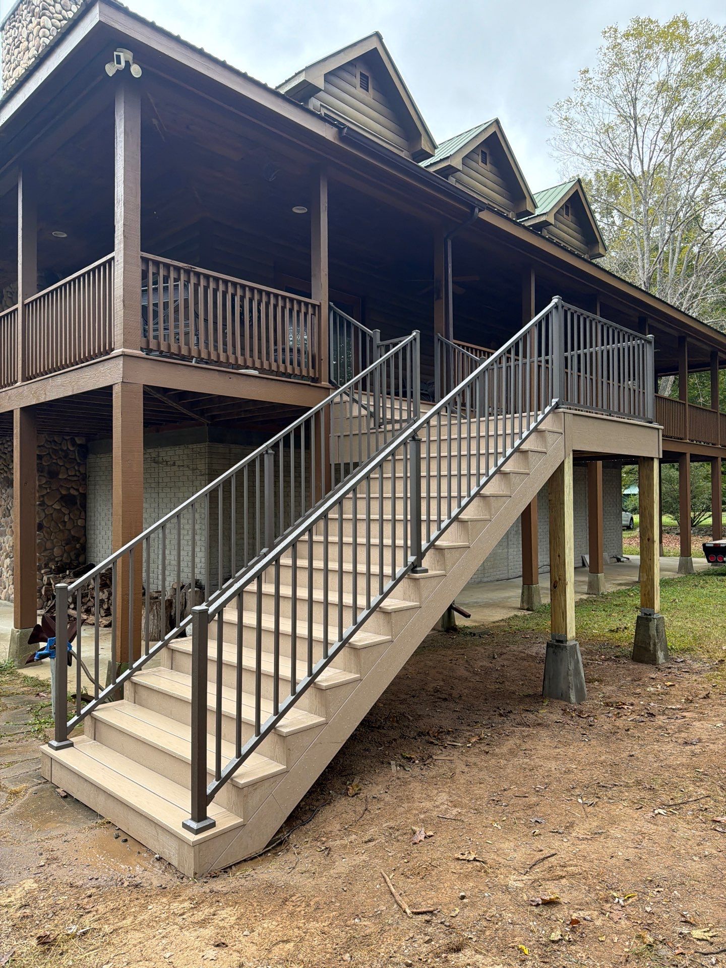 Log Cabin Wrap-Around Deck and External Staircase Installation in Caldwell