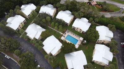 Commercial Roofing Installation using 1" Nail strip metal roof