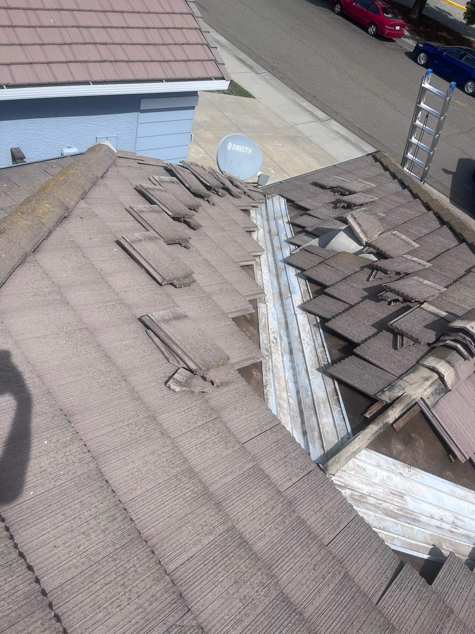 Tile Roof Repair by Grandmark Service Company