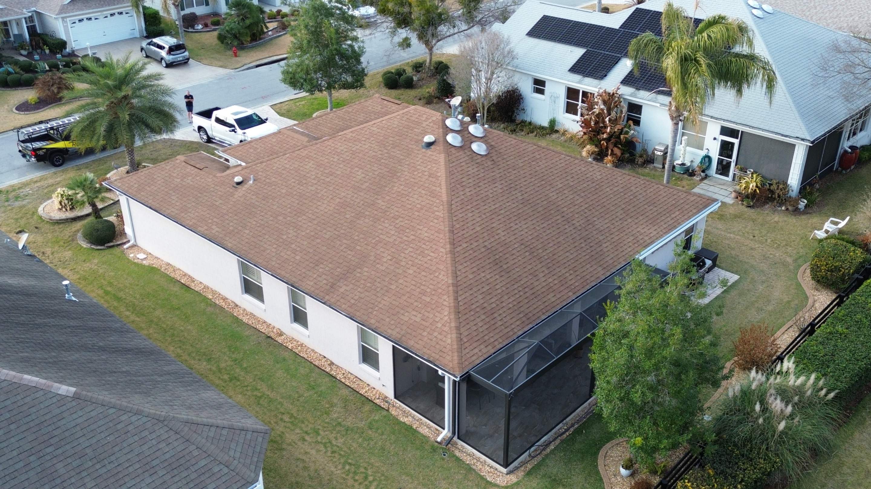 Before and after drone pictures in The Villages FL by Gold Key Roofing