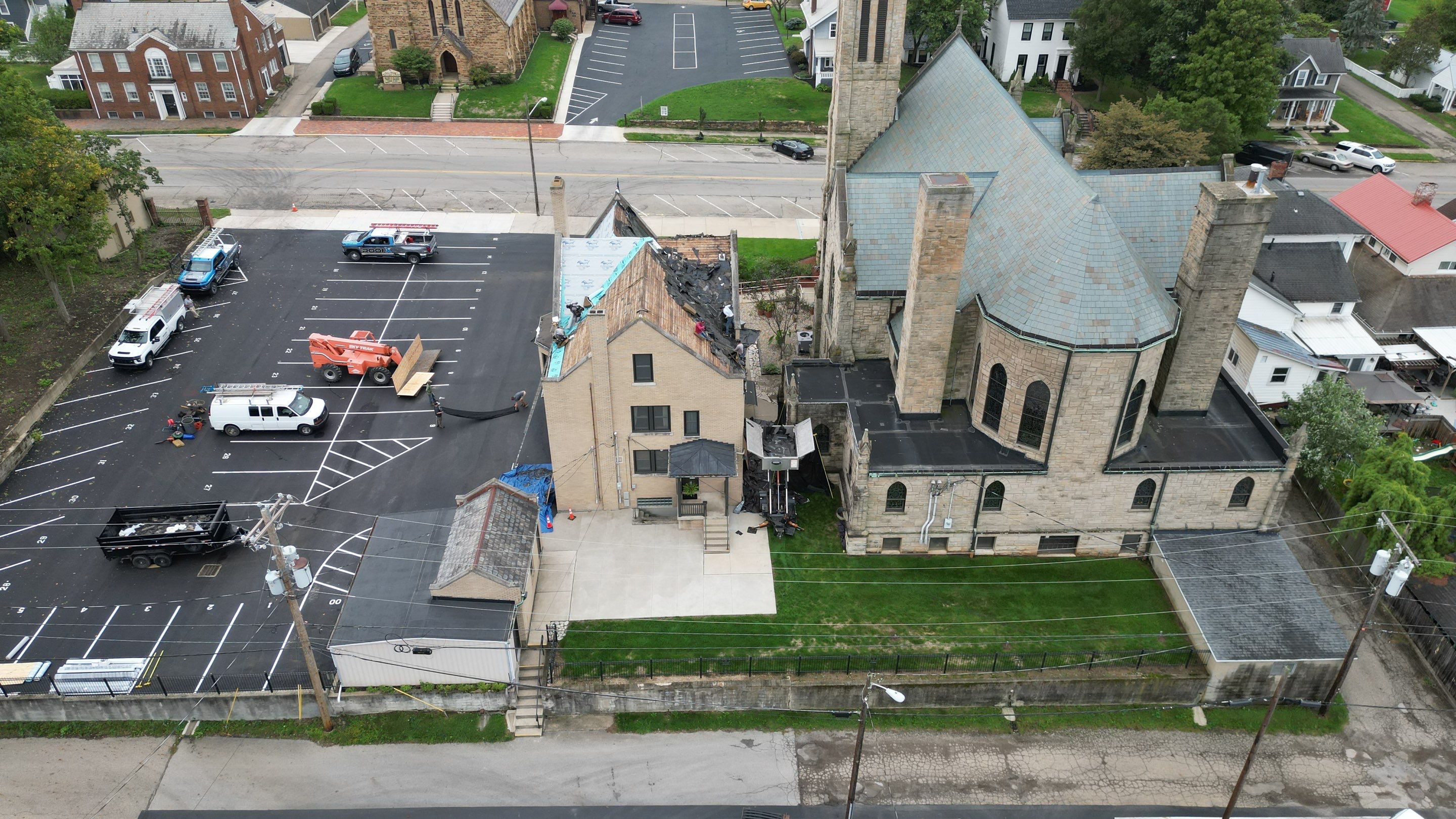 Commercial Roofing Installation using Standing Seam Metal - Frost Black by RoofX 
