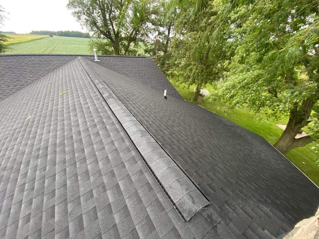 Storm damage roof replacement by Nitro Roofing and Construction