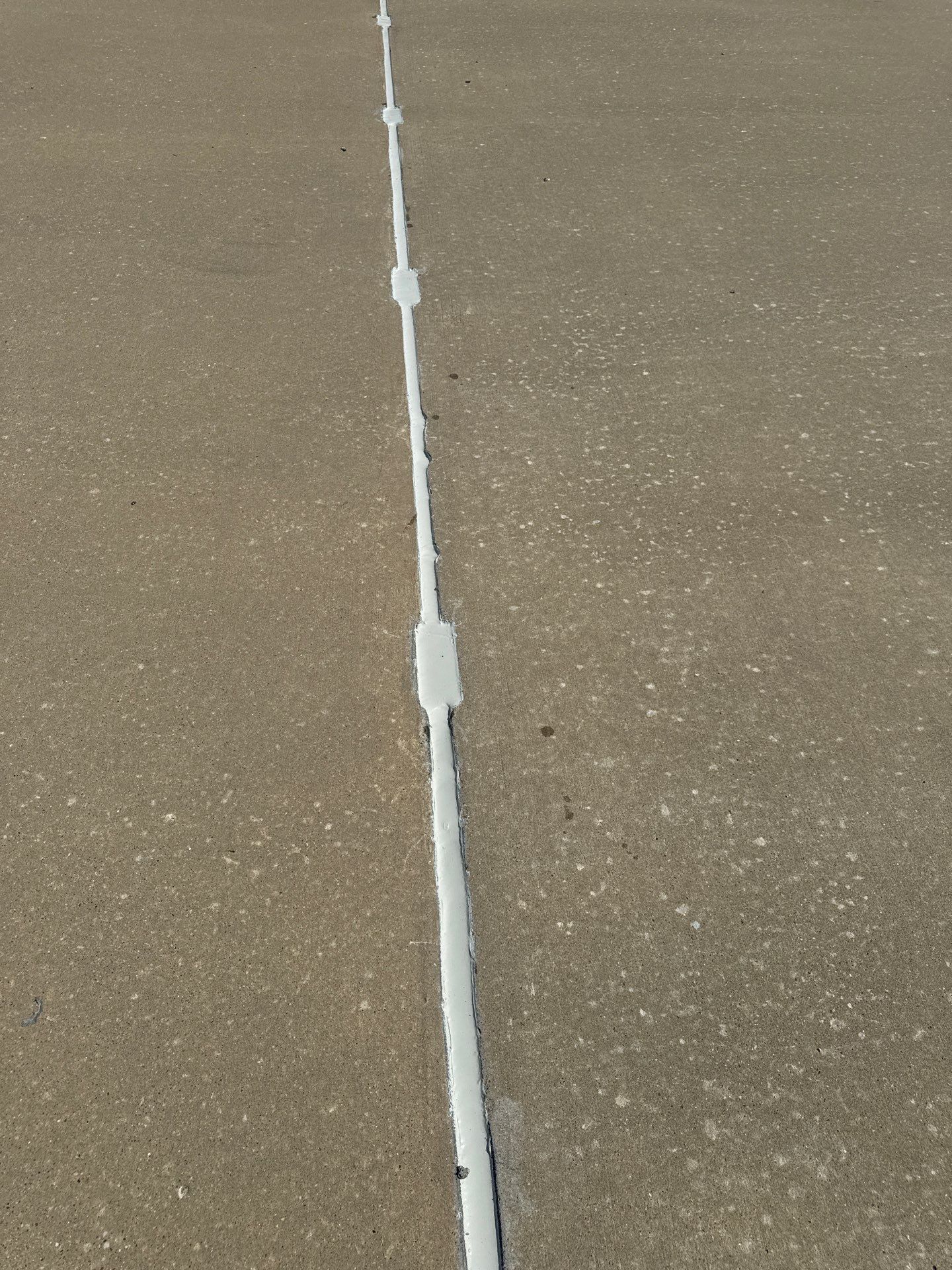 Comprehensive Concrete Joint and Crack Repair for Louisville Parking Garage Top Deck by Performance Waterproofing LLC