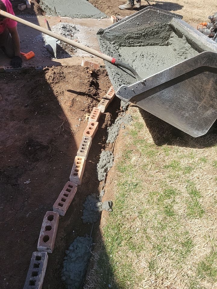 Concrete sidewalk using Concrete by Clays Services Inc
