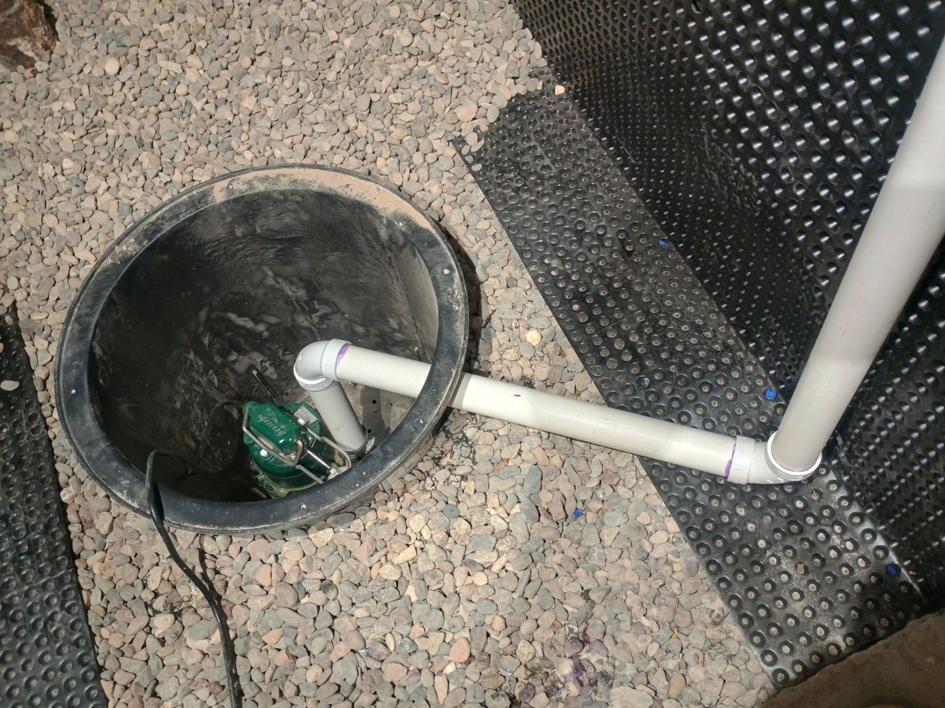 Interior Drain Tile & Sump Pump System in West Minneapolis by Waterproofing Northeast