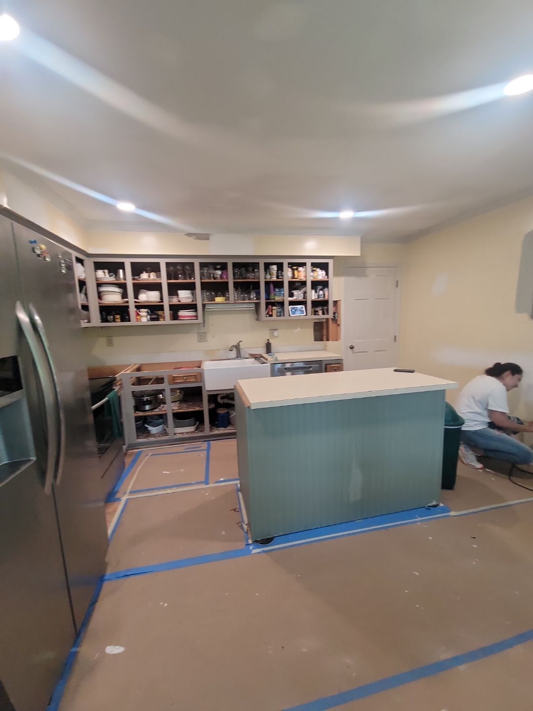 A Pathway to Personality – A Two-Tone Kitchen Transformation in Apex by Elite Remodeling and Design LLC