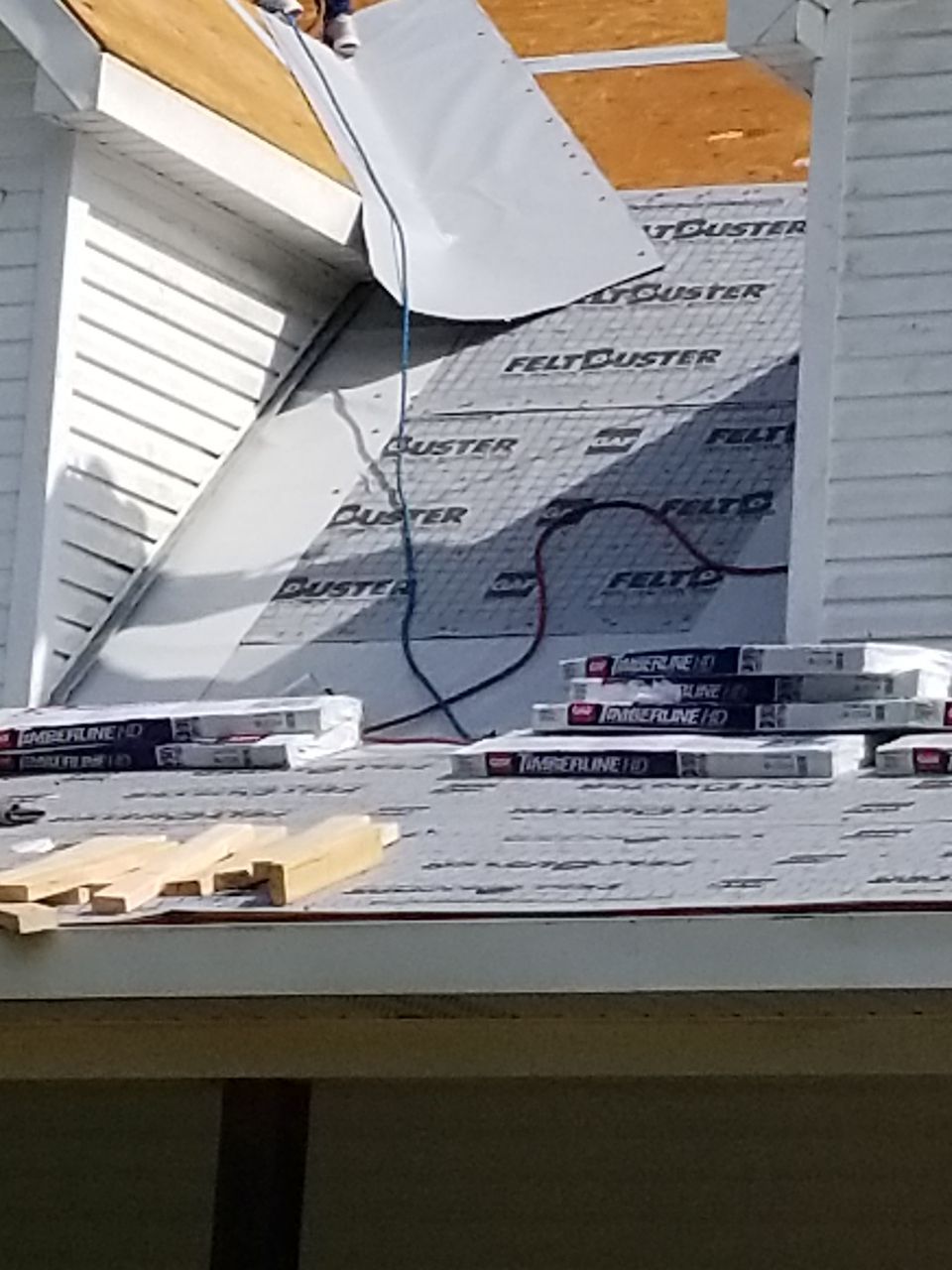 Residential Roofing Installation using Roof Replacement by American Roofing & Construction LLC