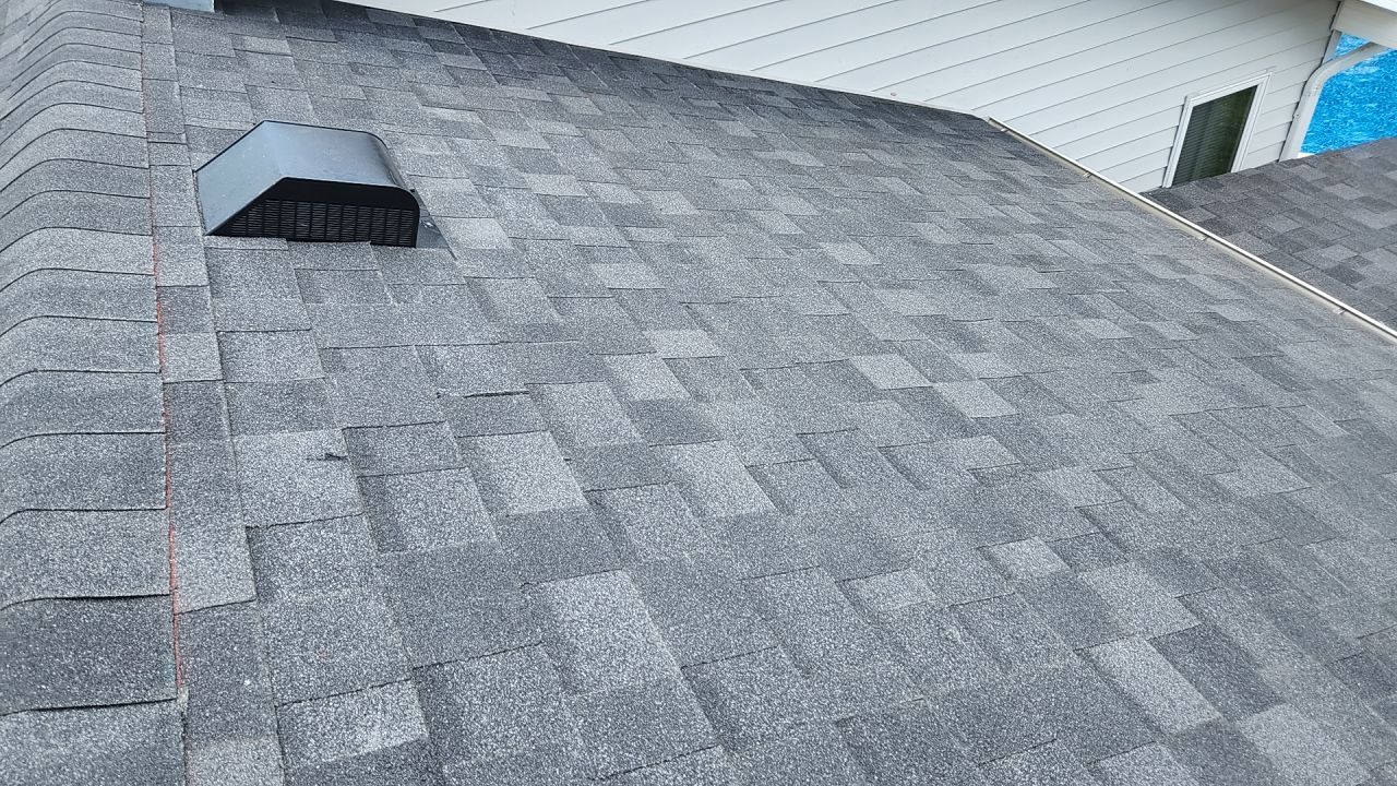 Roofing / Siding / Gutters using IKO Dynasty Granite Black / Norandex Siding by Lightning Exteriors