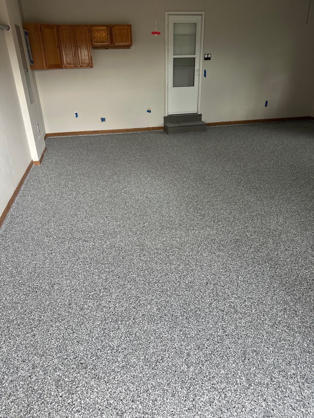 Epoxy Garage Floor Transformation and Concrete Repair in Beatrice by Goat Coatings
