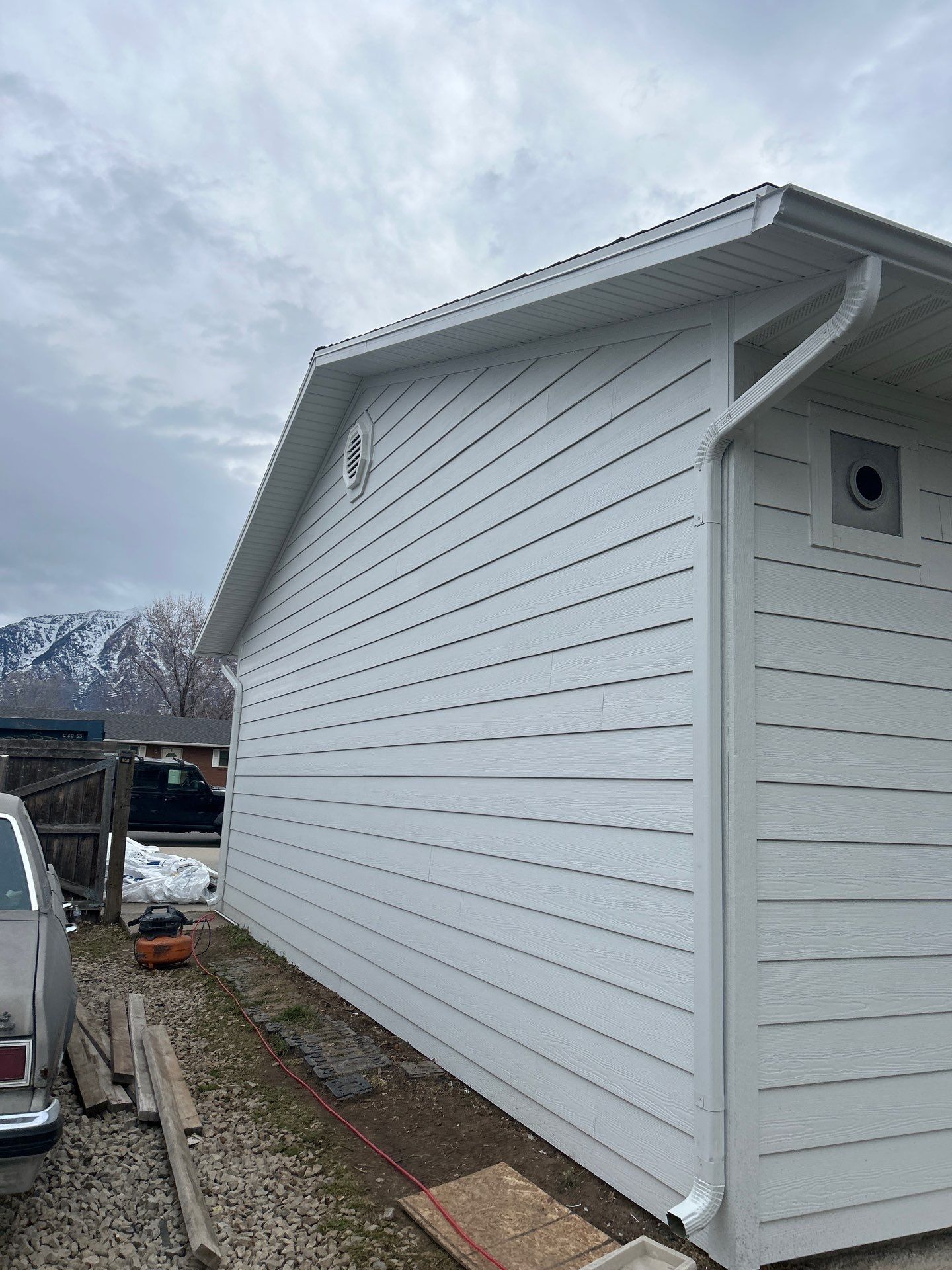 Orem | Crisp Monochromatic Hardie Upgrade | Arctic White by Ideal Siding Utah