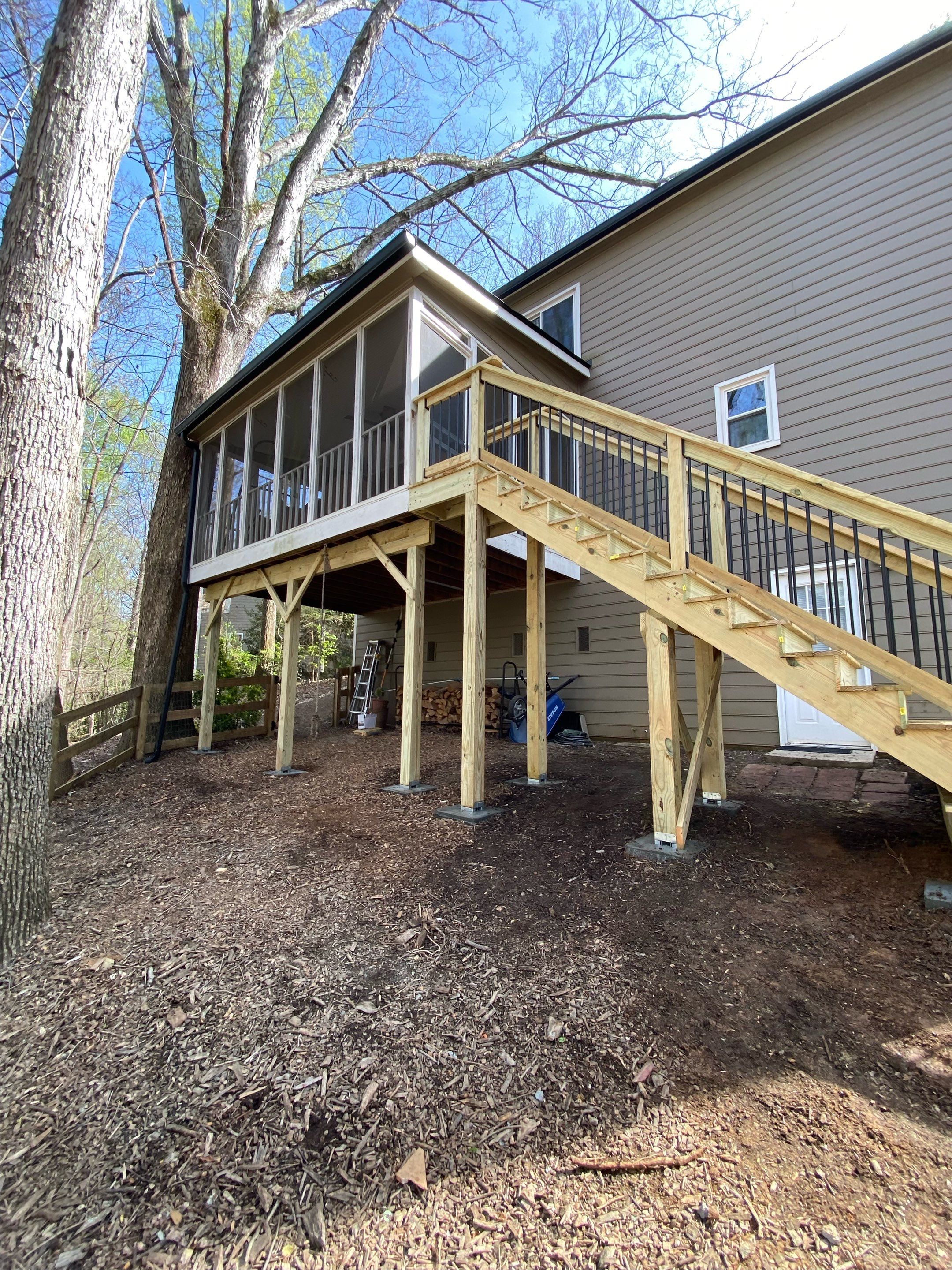 Pressure-Treated Wood Deck and Staircase Installation in Kennesaw by Swift Home Renovations 