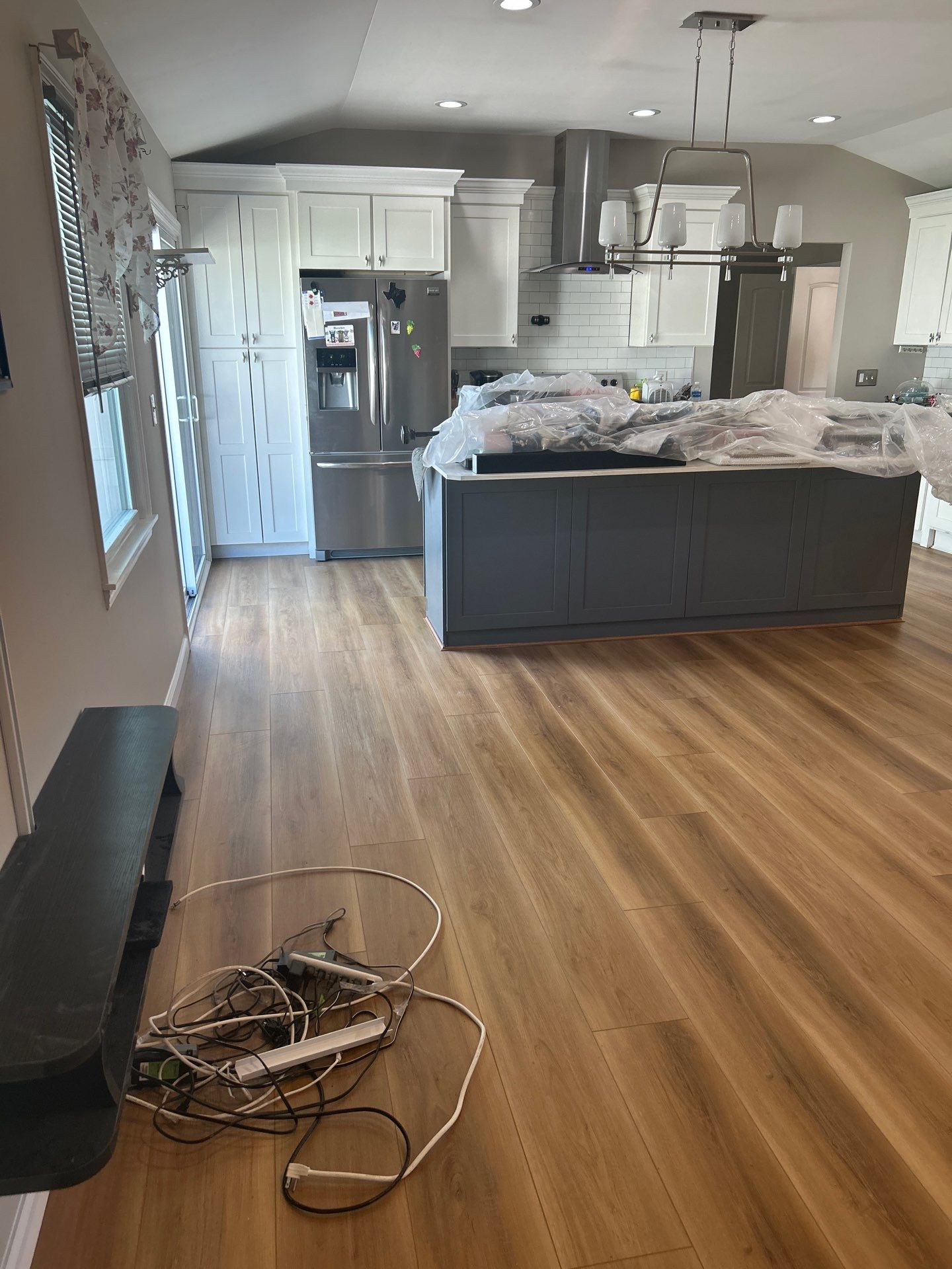 Water Damage Restoration and Full Laminate Floor Installation in Stony Brook by EMS Restoration Corp