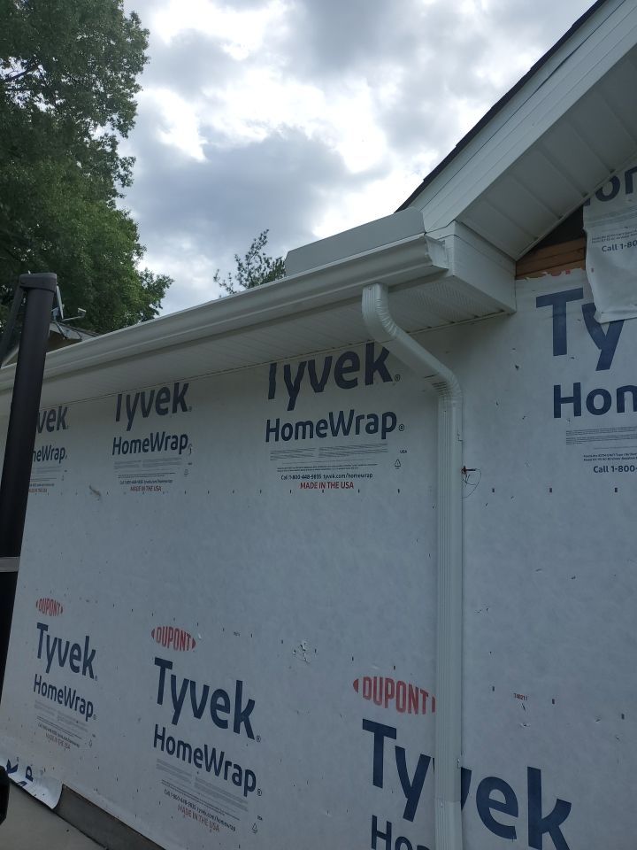 Gutter Installation using 5" Seamless Aluminum Gutters by Absolute Roofing and Construction