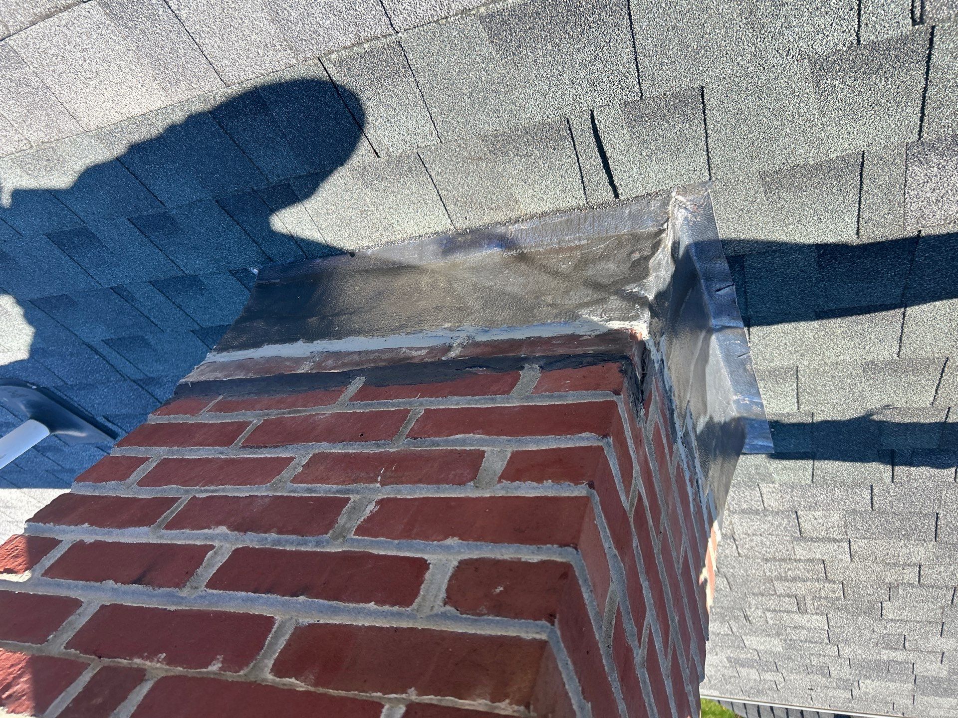 Chimney Flashing Repair & Leak Prevention | Andover, MA by Mighty Dog Roofing of Greater Middlesex County