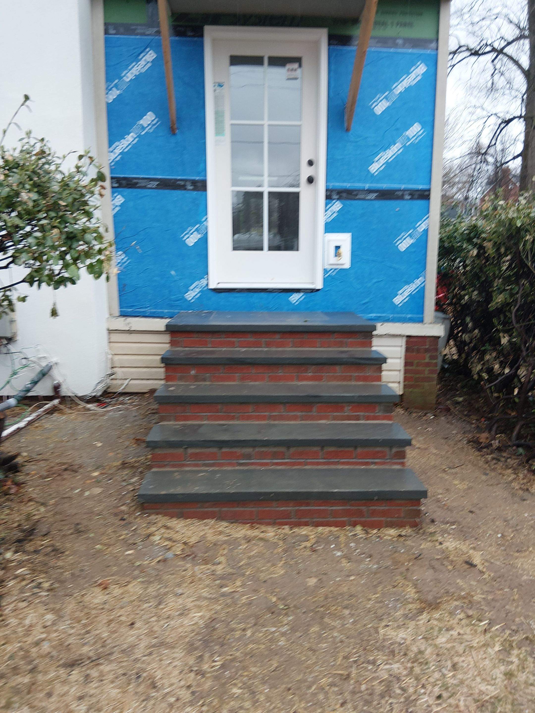Custom Brick Step and Metal Railing Installation in Silver Spring by Capitol Iron Works
