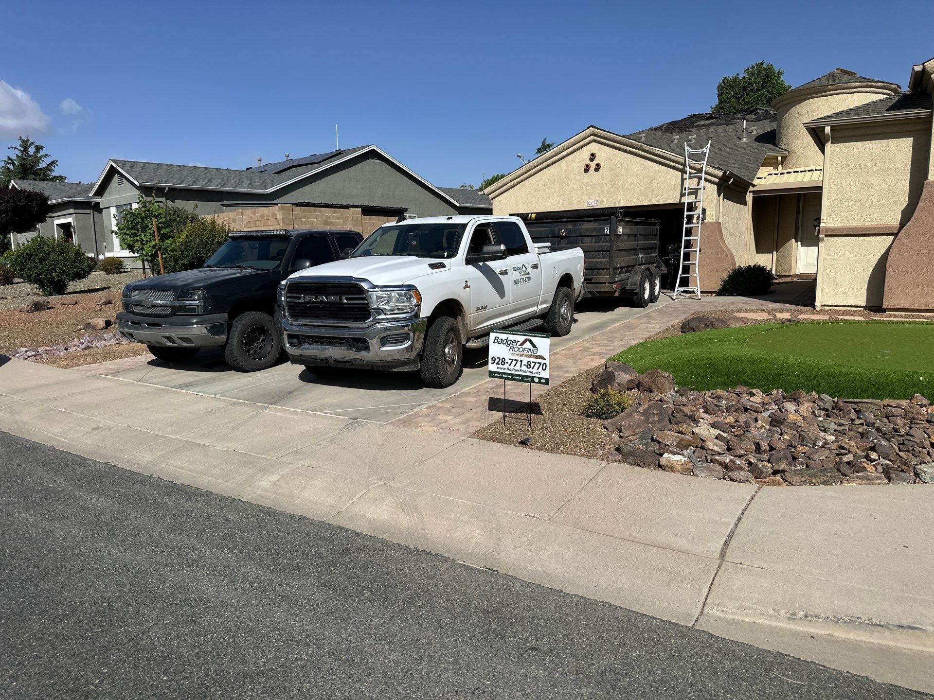 Residential Roofing Installation with Architectural Shingles and Turret Detail by Badger Roofing