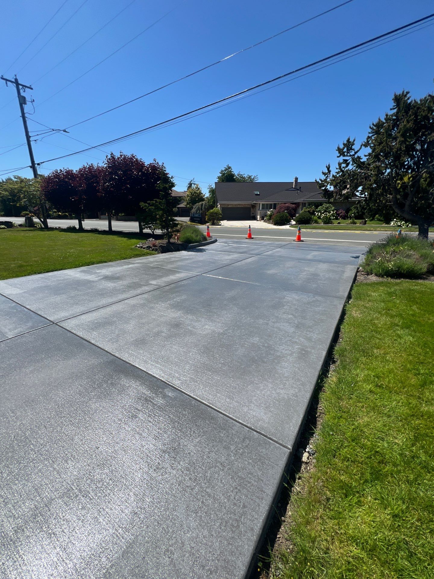Colored Concrete Driveway Repair with Sealer| Everett    by Jireh Asphalt & Concrete Inc 