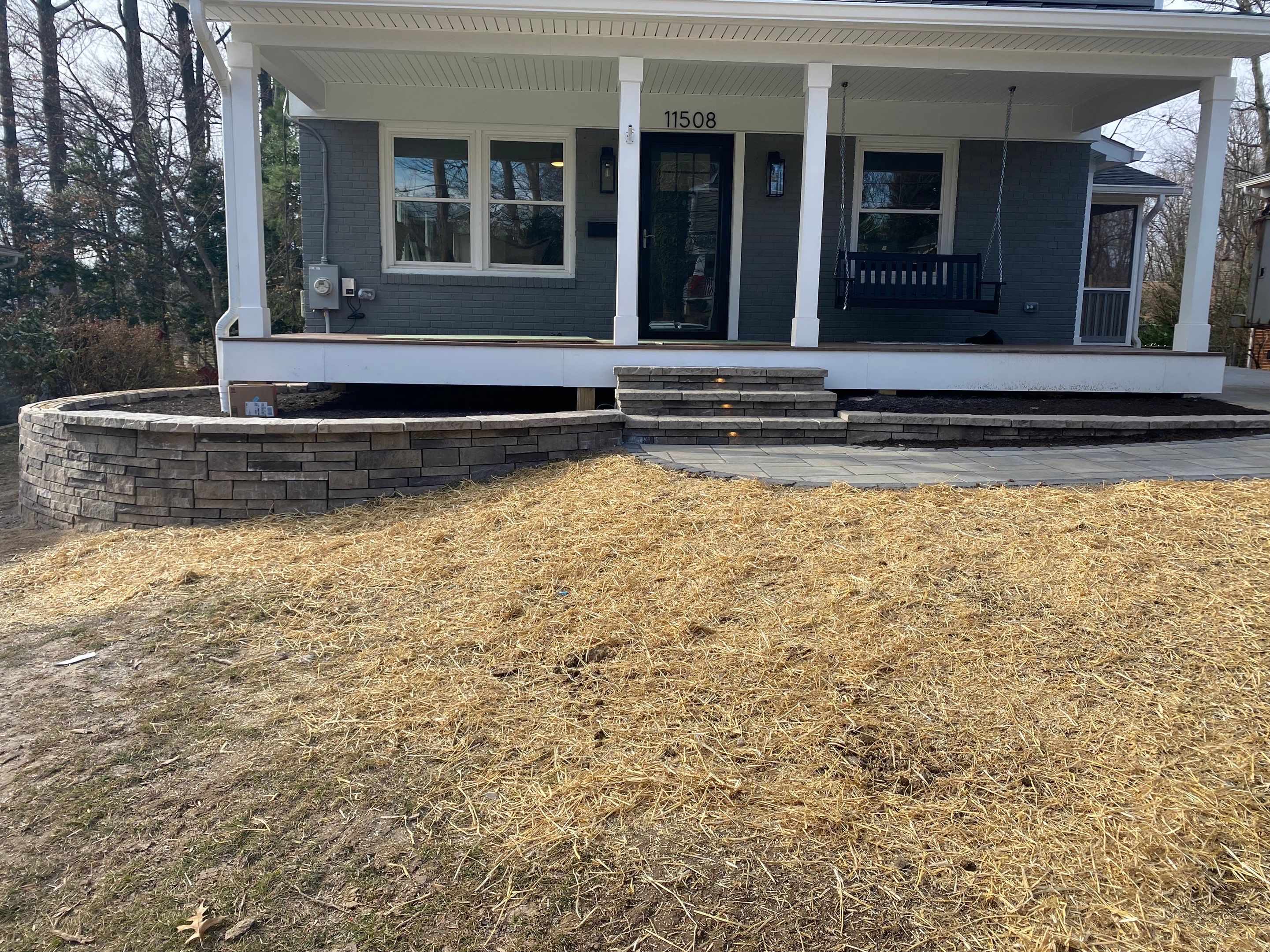 Retaining wall, walkway, small patio and landscape install by The Smet Companies, LLC