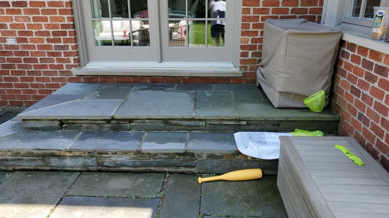 concrete driveway cleaning using Algaecide, soft wash soap by Northern Power Washing LLC.