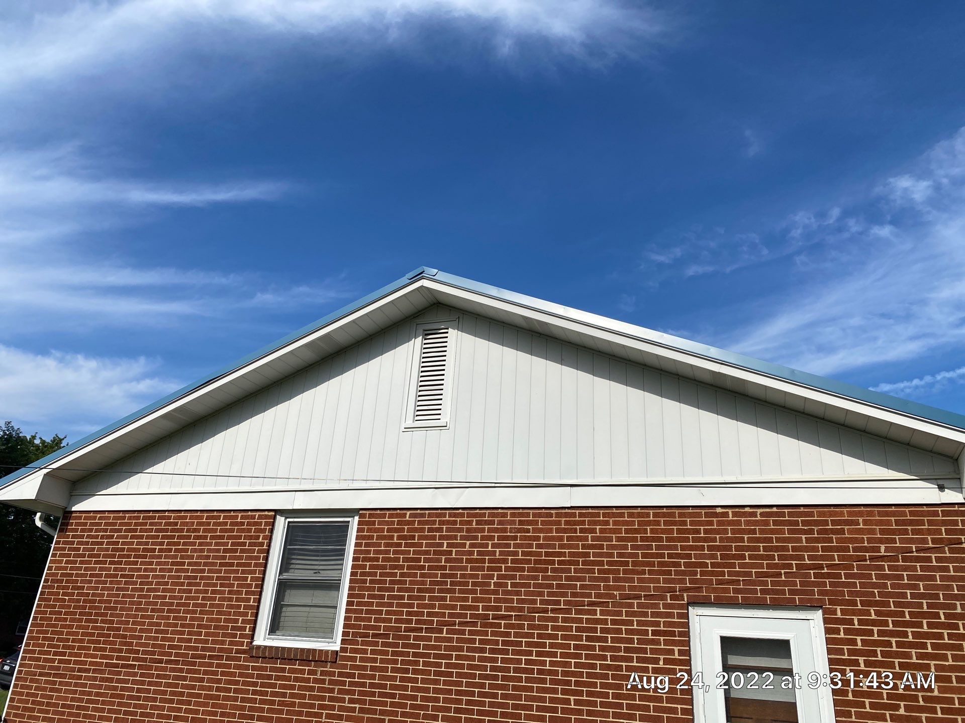 Carolina Blue Standing Seam Roof by Just In Time Roofing and Restoration