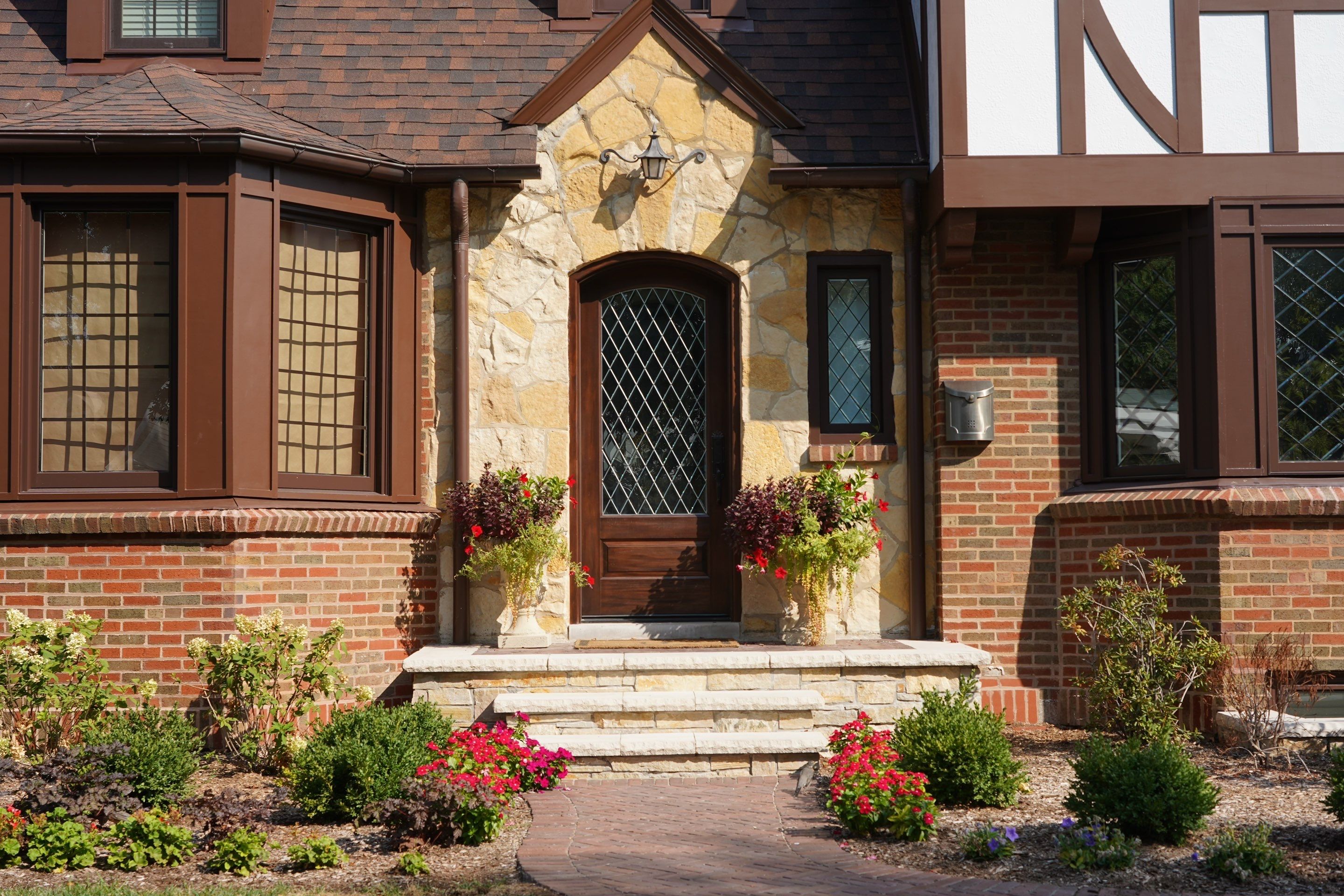 Tudor-Style Hardie Exterior Renovation in Elmhurst by Great American Exteriors