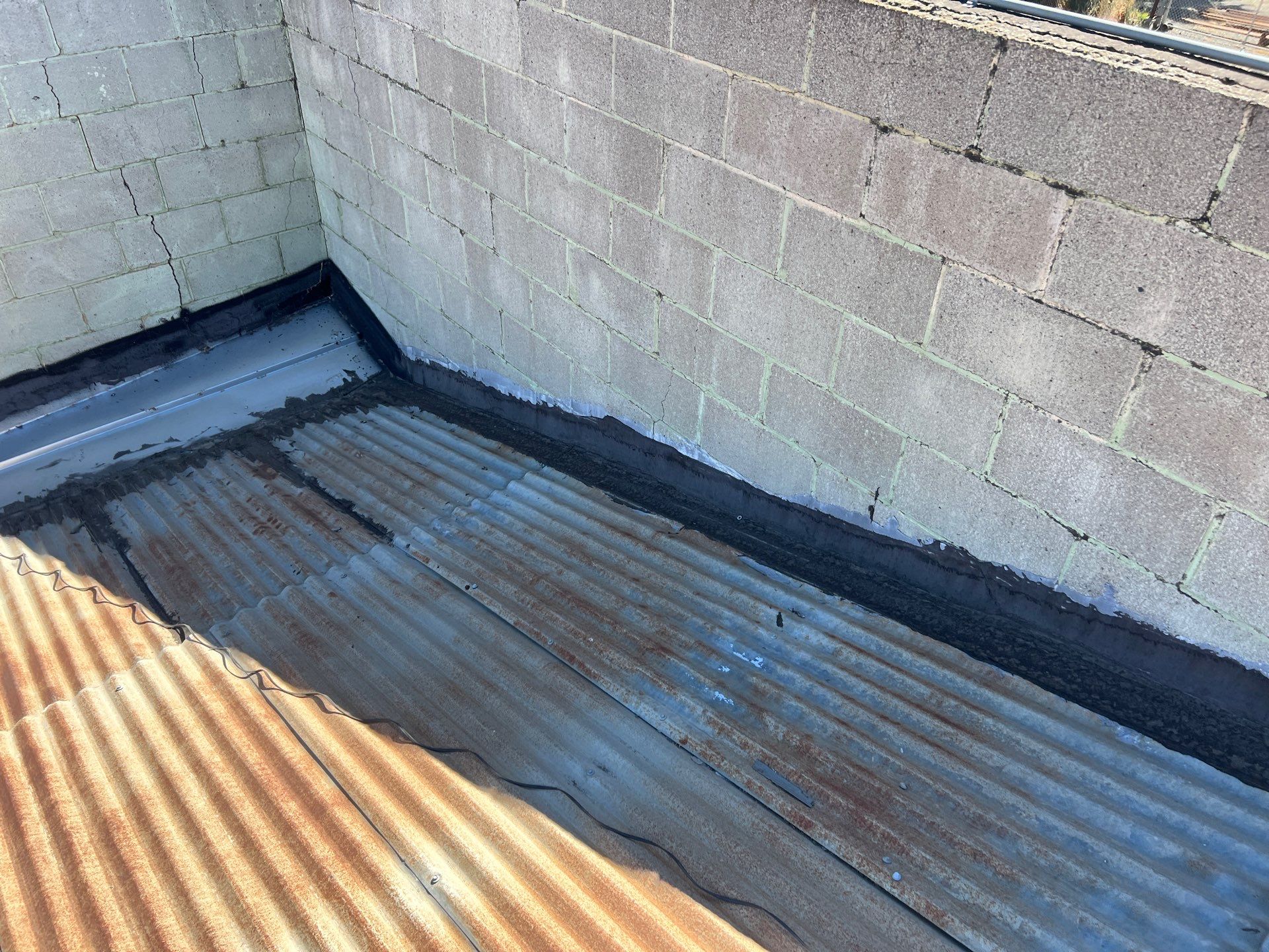 Spray foam and coatings using Conklin Benchmark/ PUMA XL acrylic coatings over metal and foam by Straight Edge Roofing Inc