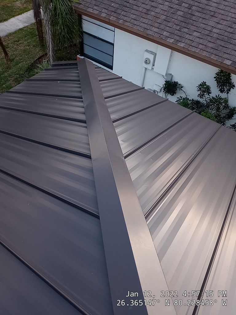 Residential Roofing Installation using 1" Nail strip metal roof by BLUES BROTHERS CONSTRUCTION CORP