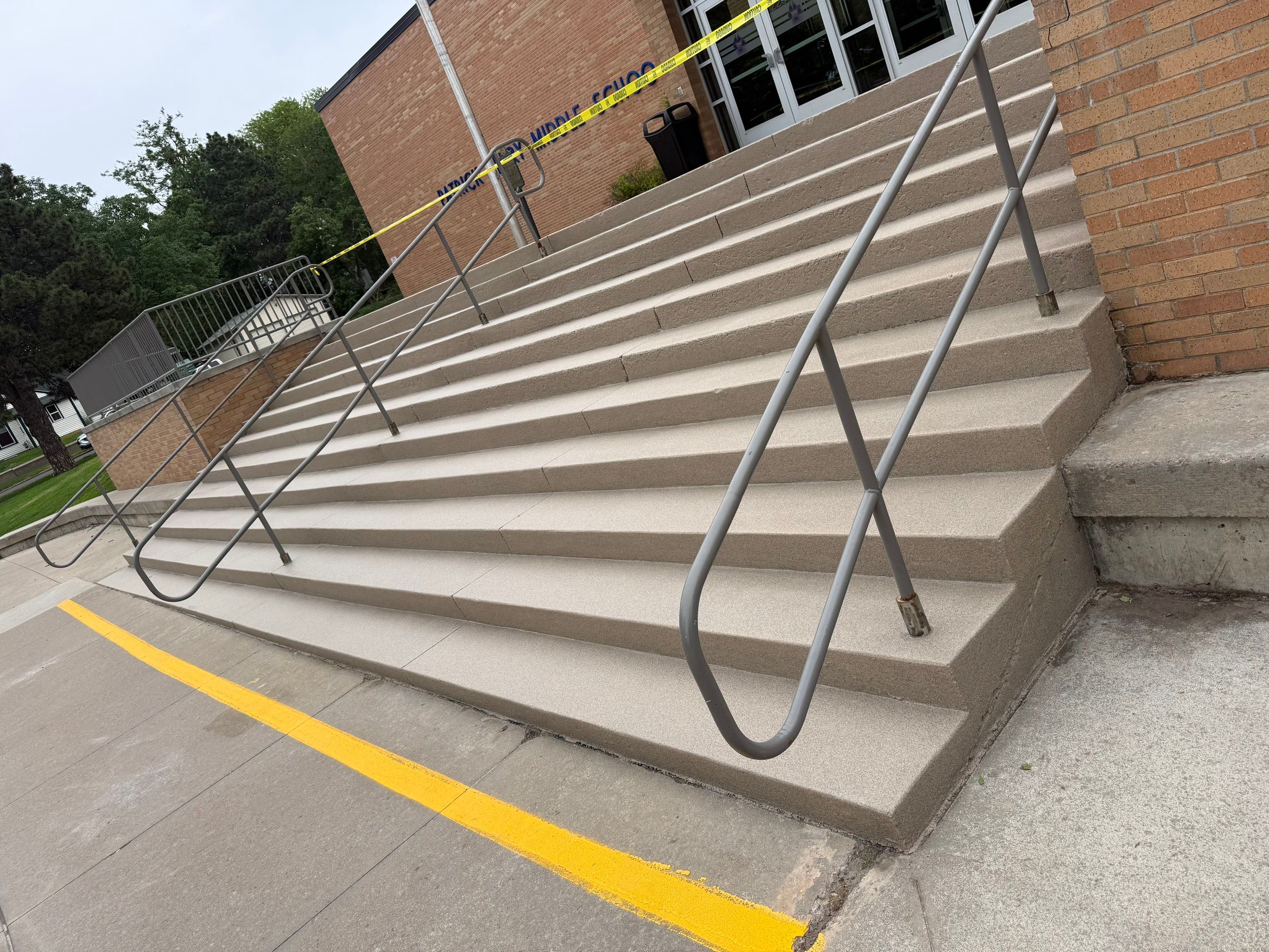 Concrete Stair Repair and Protective Coating in Sioux Falls by Select Painting, Coatings & Garage Cabinets