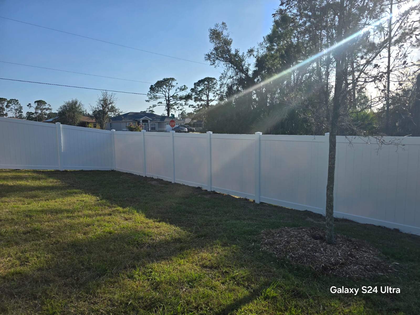 Residential White Vinyl Privacy Fence Installation in North Port by True Fence LLC