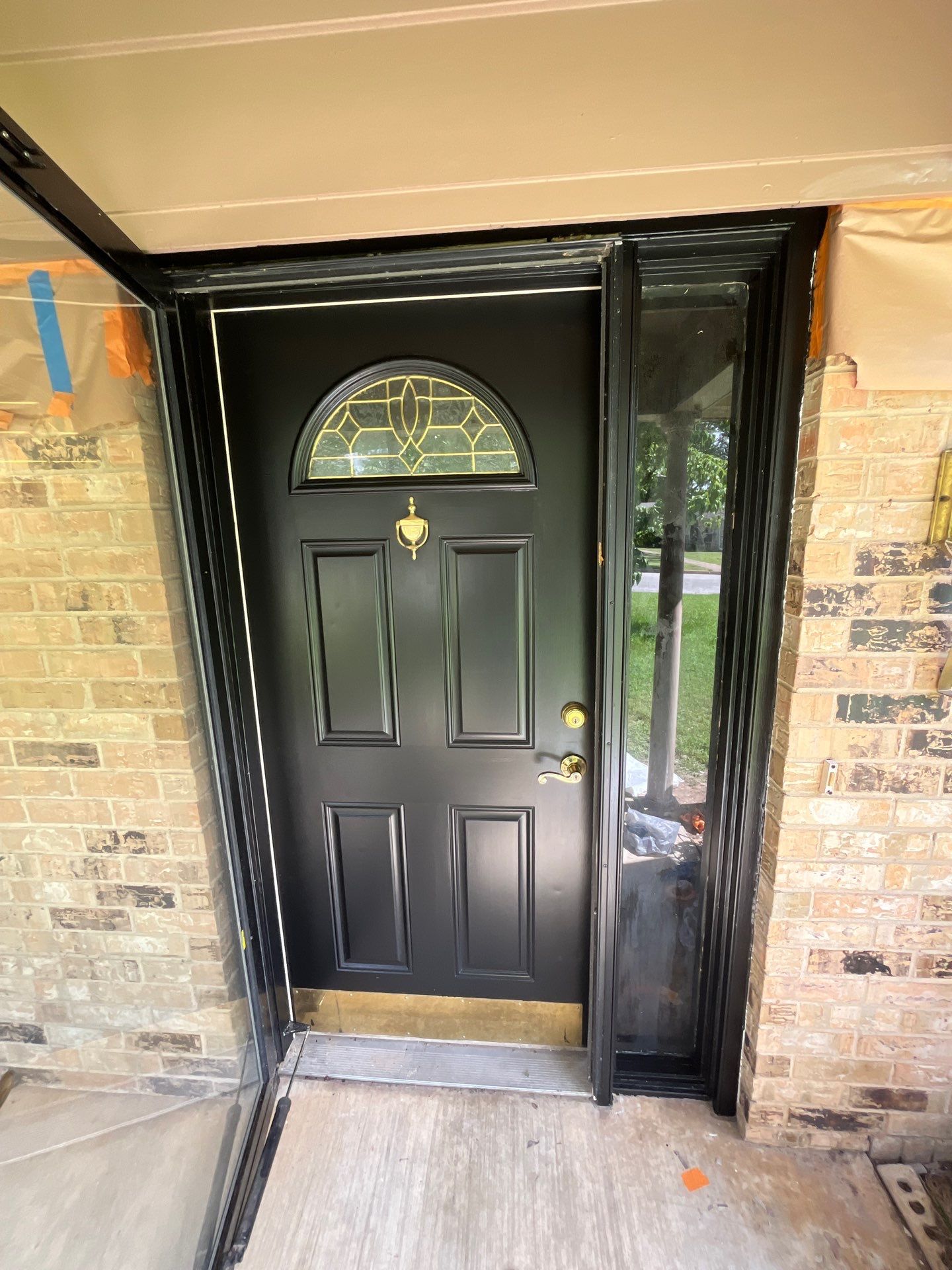 Exterior Painting in Tyler, TX | Eaves, Door & Columns in Elegant Black by Quality Coats Painting