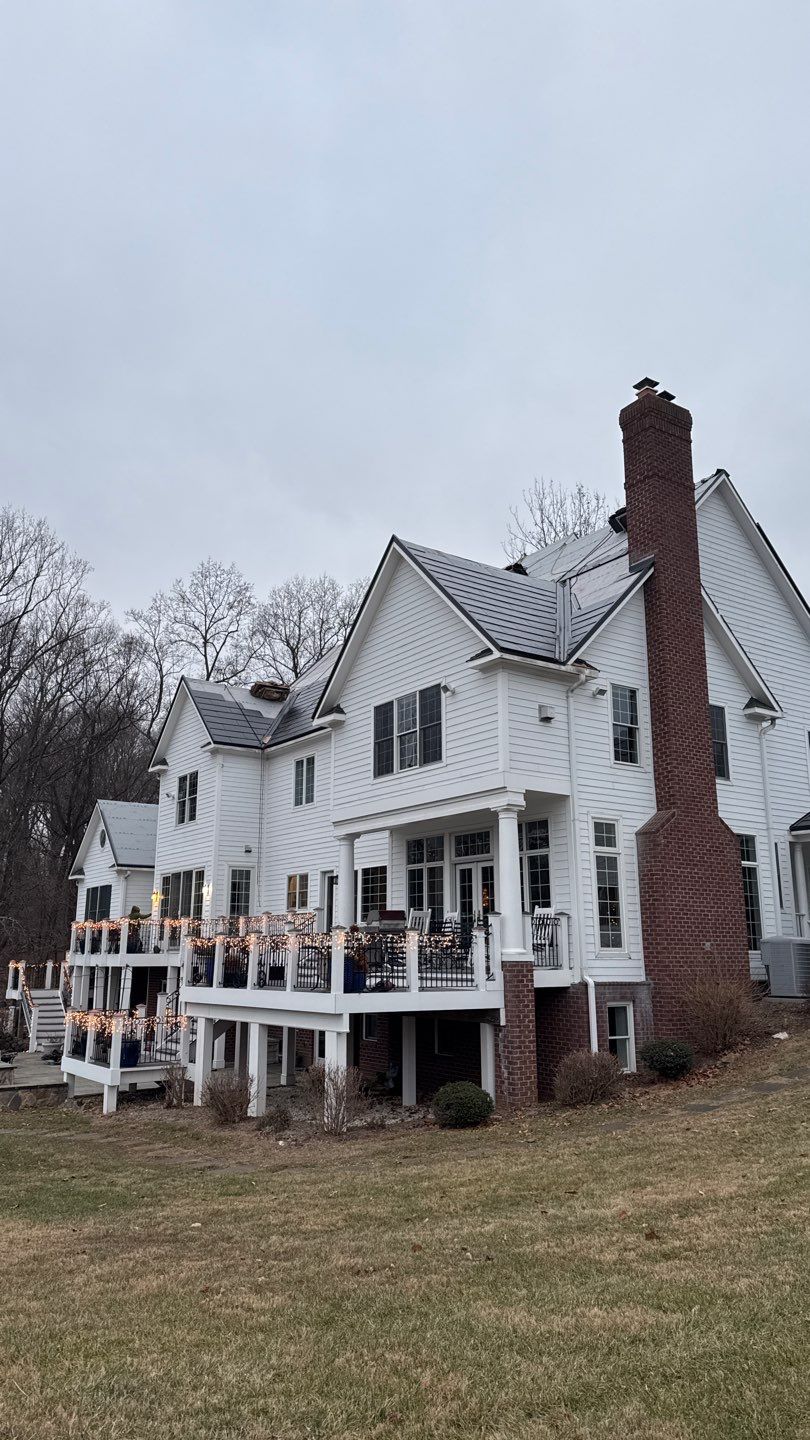 Tesla Solar Roof  using Tesla Powerwall by American Home Contractors