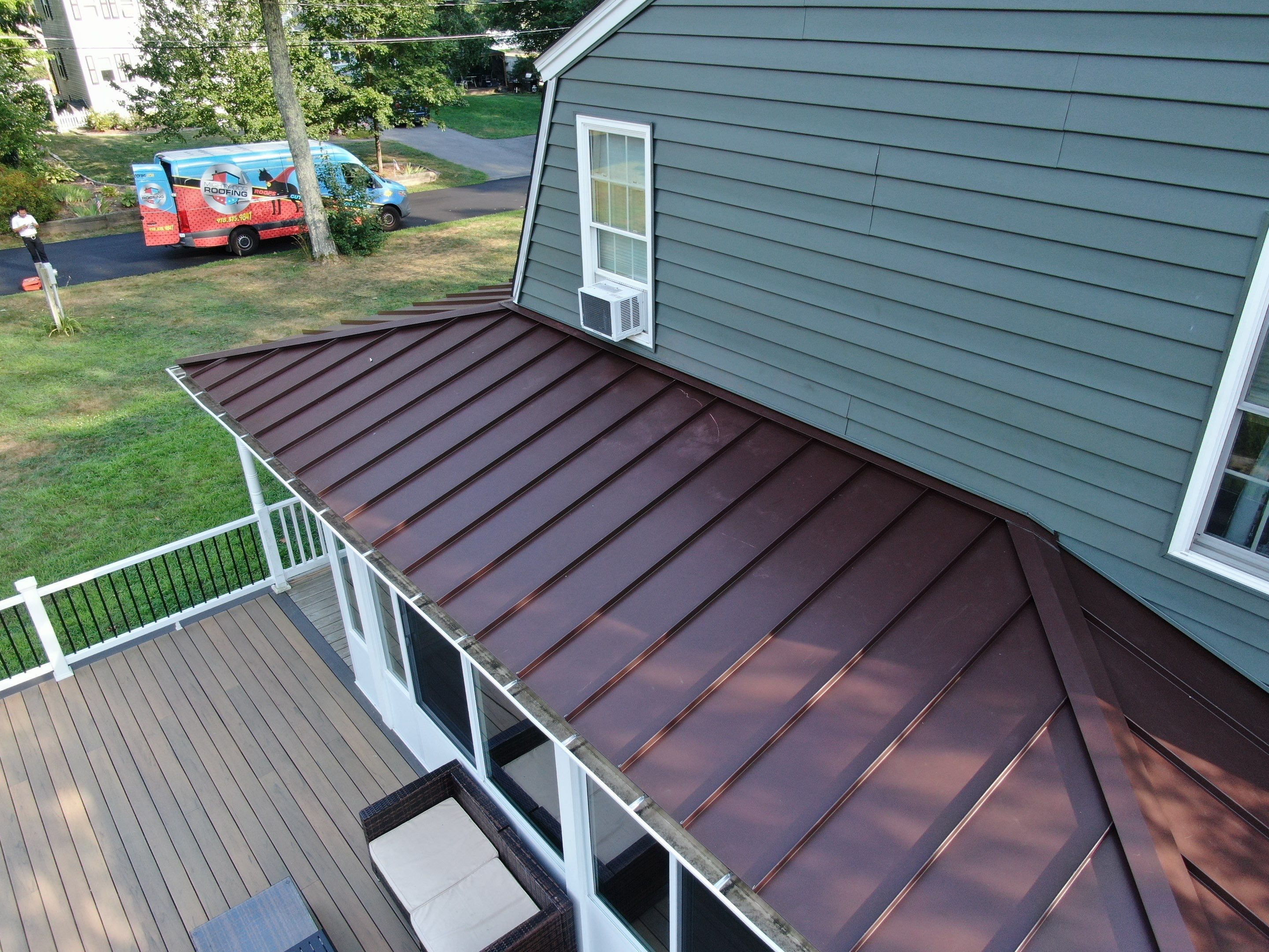 Full Roof Replacement & Farmers Porch Restoration – Asphalt + Standing Seam Metal by Mighty Dog Roofing of Greater Middlesex County